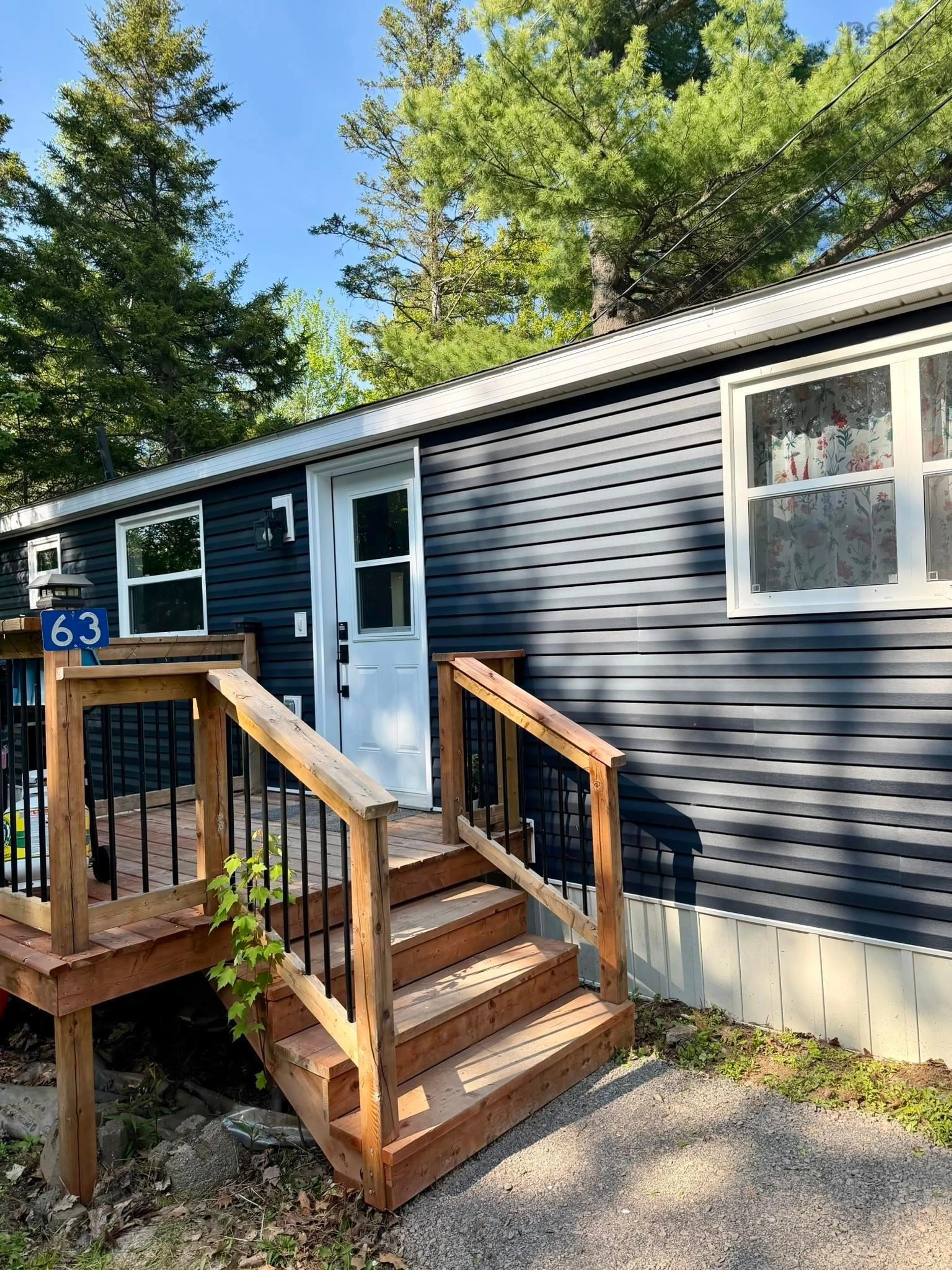 Home with vinyl exterior material, street for 63 Homco Dr, New Minas Nova Scotia B4N 5C2