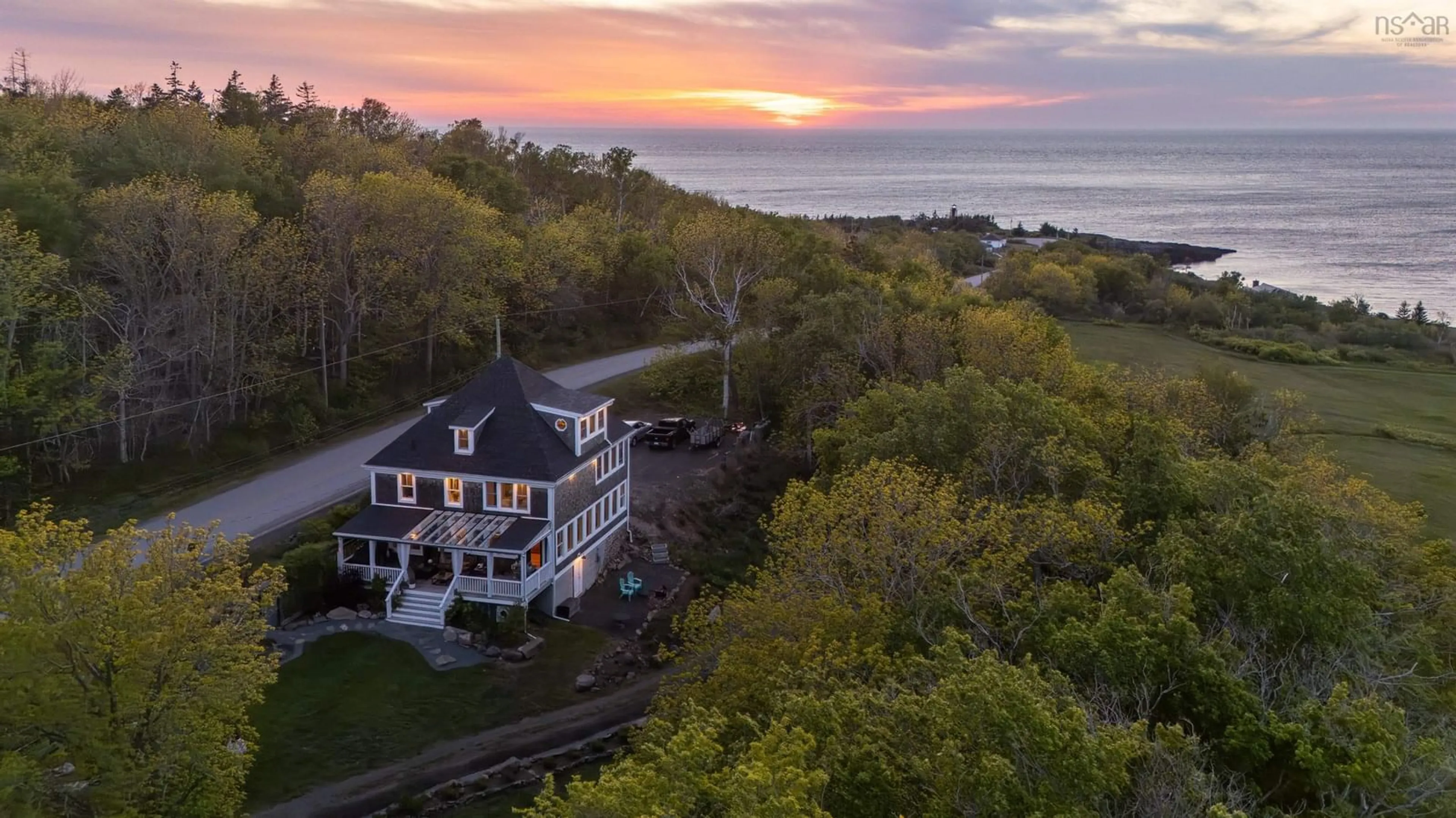 A pic from outside/outdoor area/front of a property/back of a property/a pic from drone, water/lake/river/ocean view for 1334 Lighthouse Road, Bay View Nova Scotia B0V 1A0