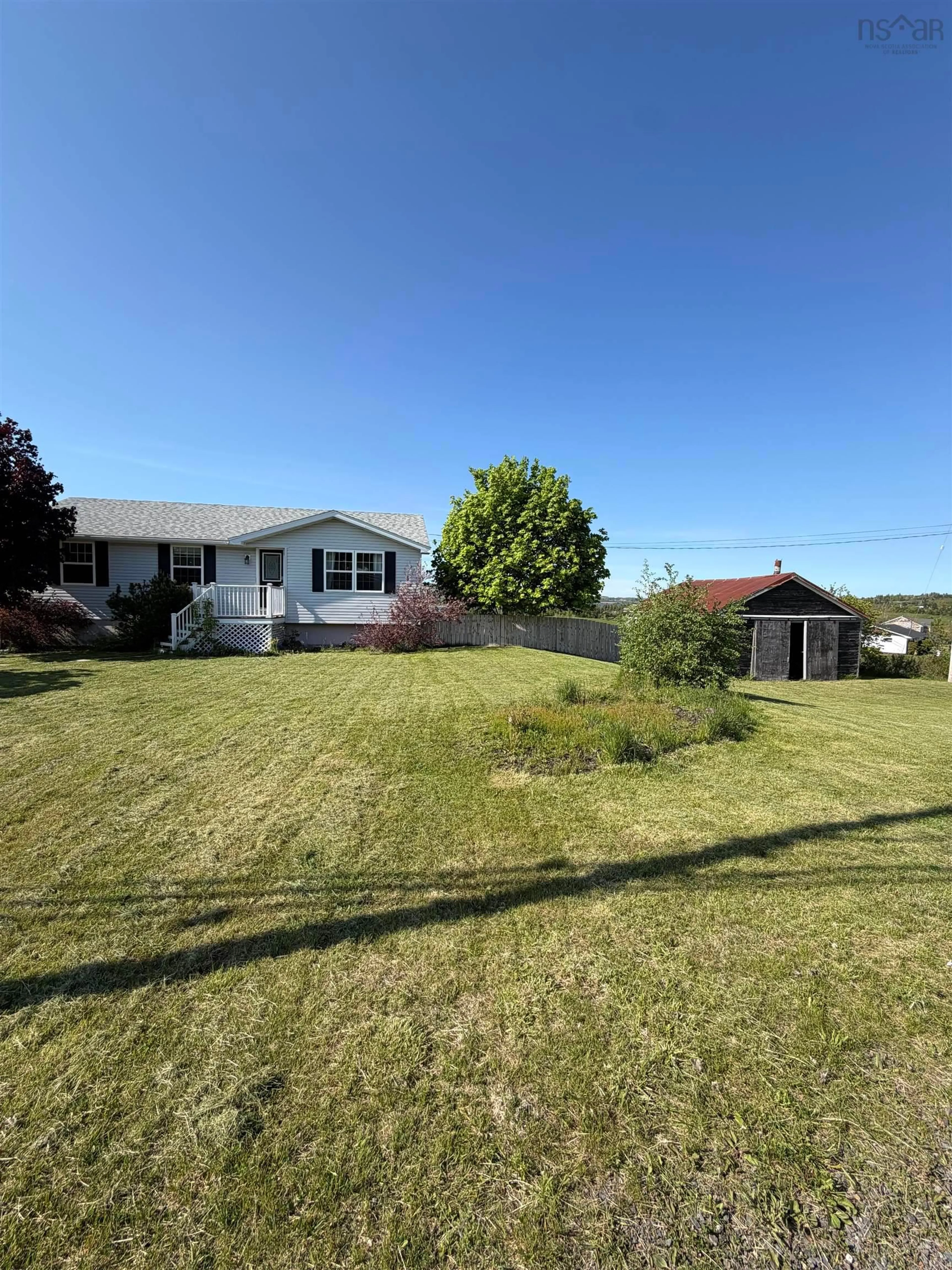 A pic from outside/outdoor area/front of a property/back of a property/a pic from drone, water/lake/river/ocean view for 4081 South River Road, Antigonish Nova Scotia B2G 0B4