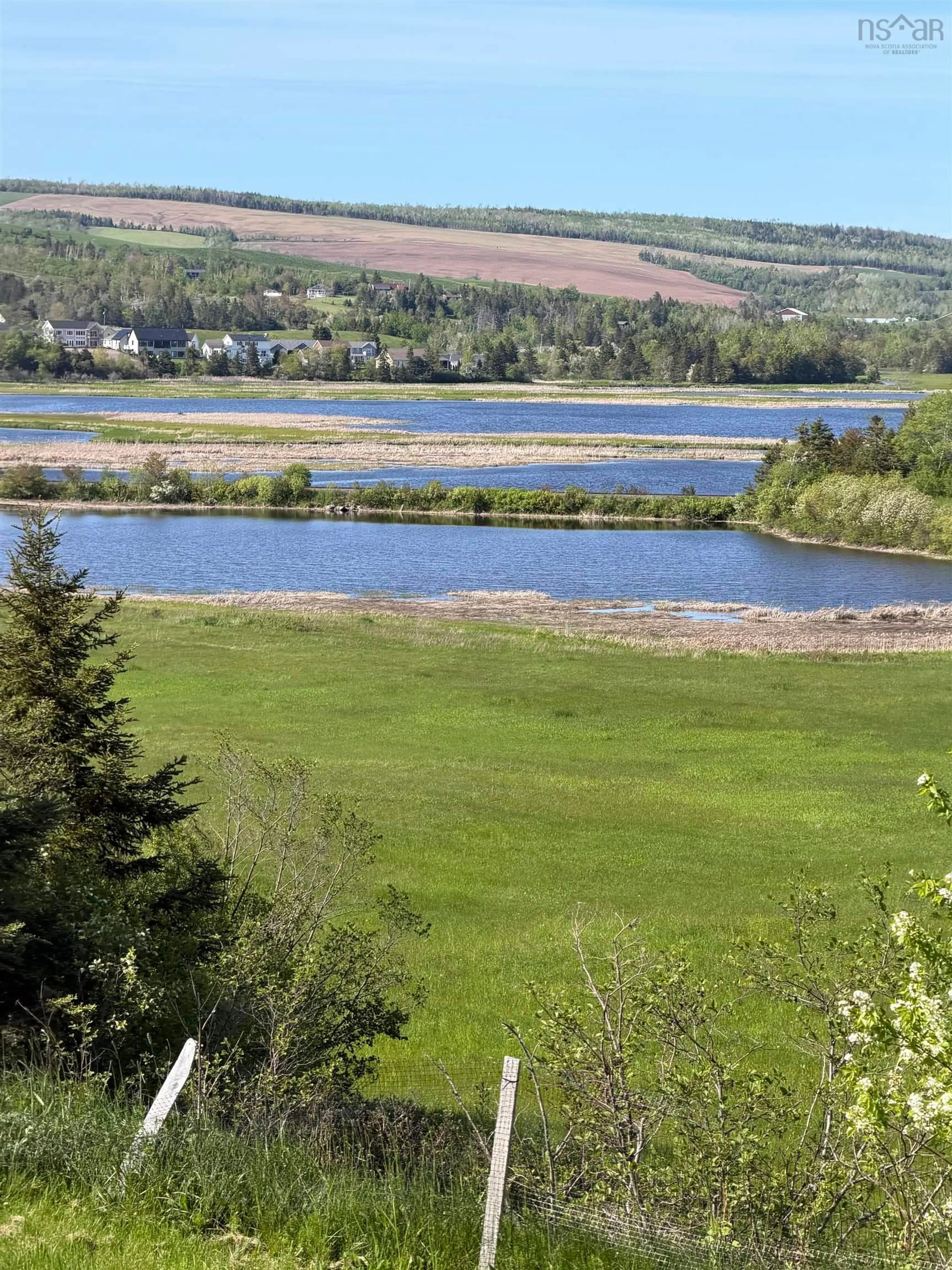A pic from outside/outdoor area/front of a property/back of a property/a pic from drone, water/lake/river/ocean view for 4081 South River Road, Antigonish Nova Scotia B2G 0B4