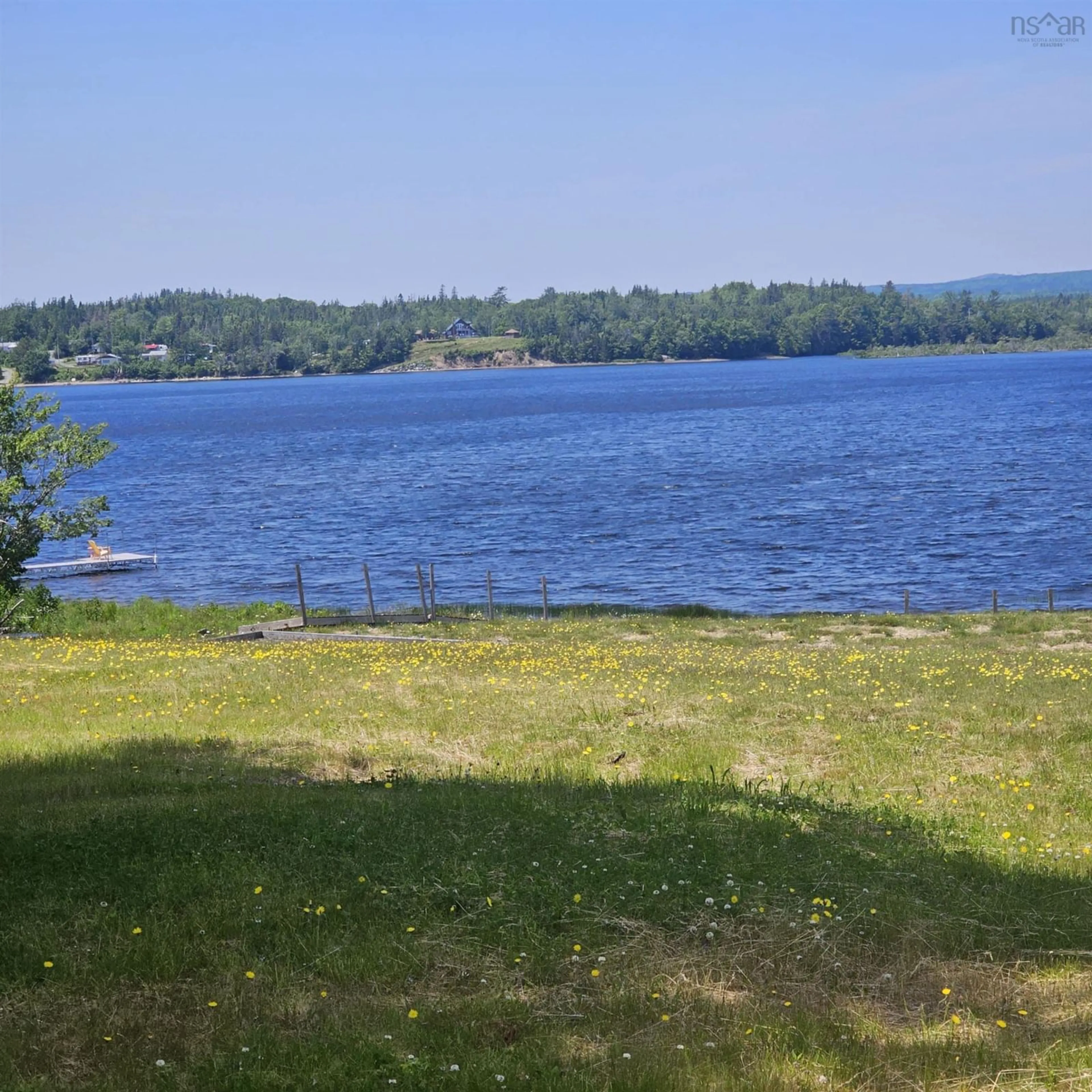 A pic from outside/outdoor area/front of a property/back of a property/a pic from drone, water/lake/river/ocean view for 1802 Grand Mira South Rd, Grand Mira South Nova Scotia B1K 1H3