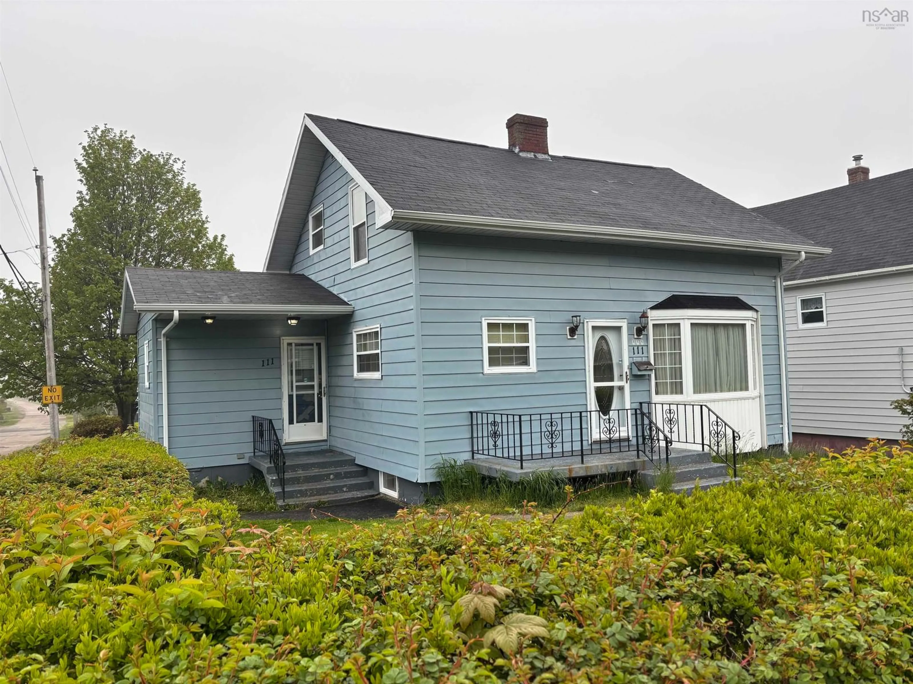 Home with vinyl exterior material, street for 111 Atlantic Street, Sydney Mines Nova Scotia B1V 1Y7