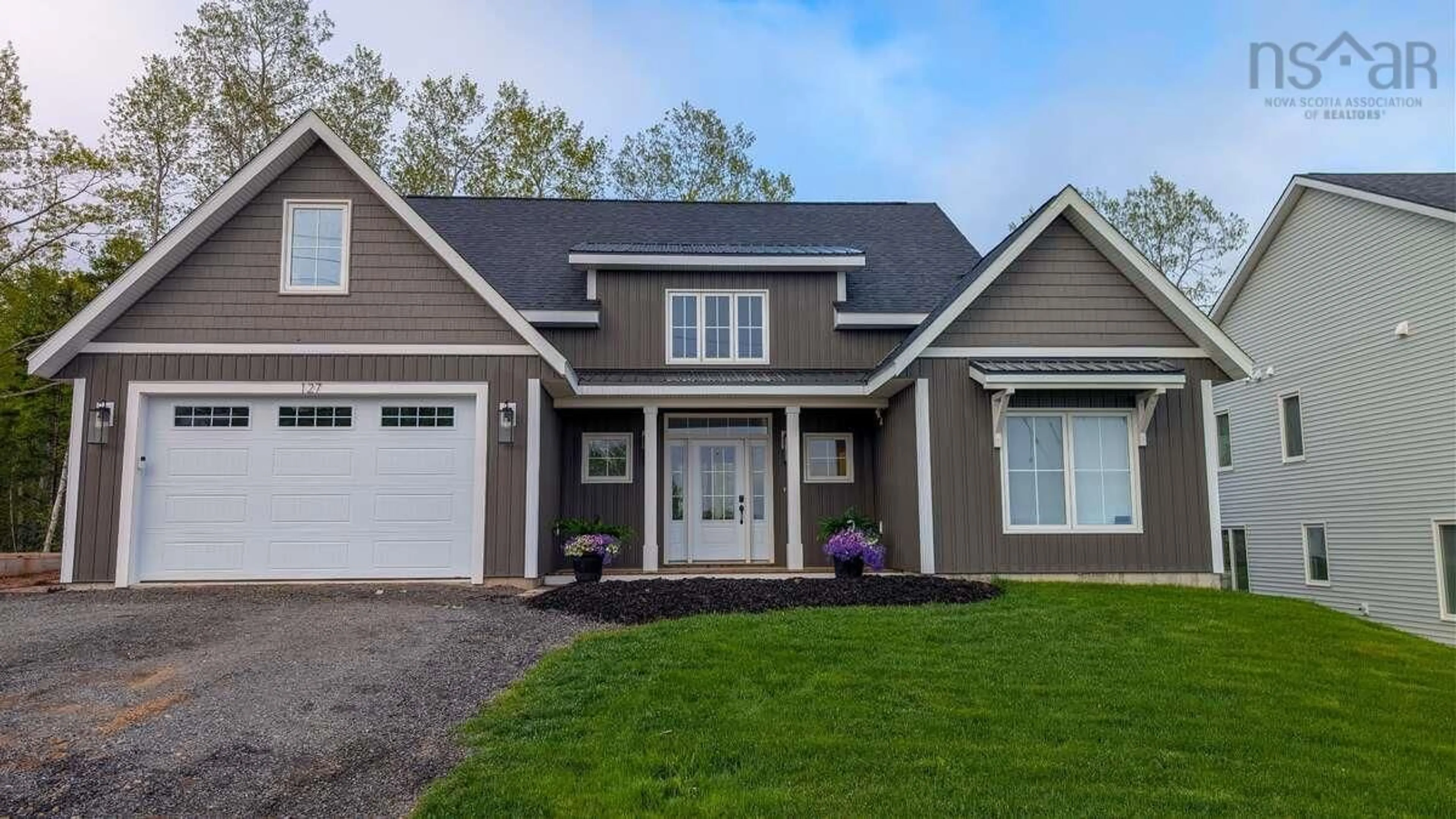 Home with vinyl exterior material, street for 127 Stirling Ave, Wolfville Nova Scotia B4P 2N3