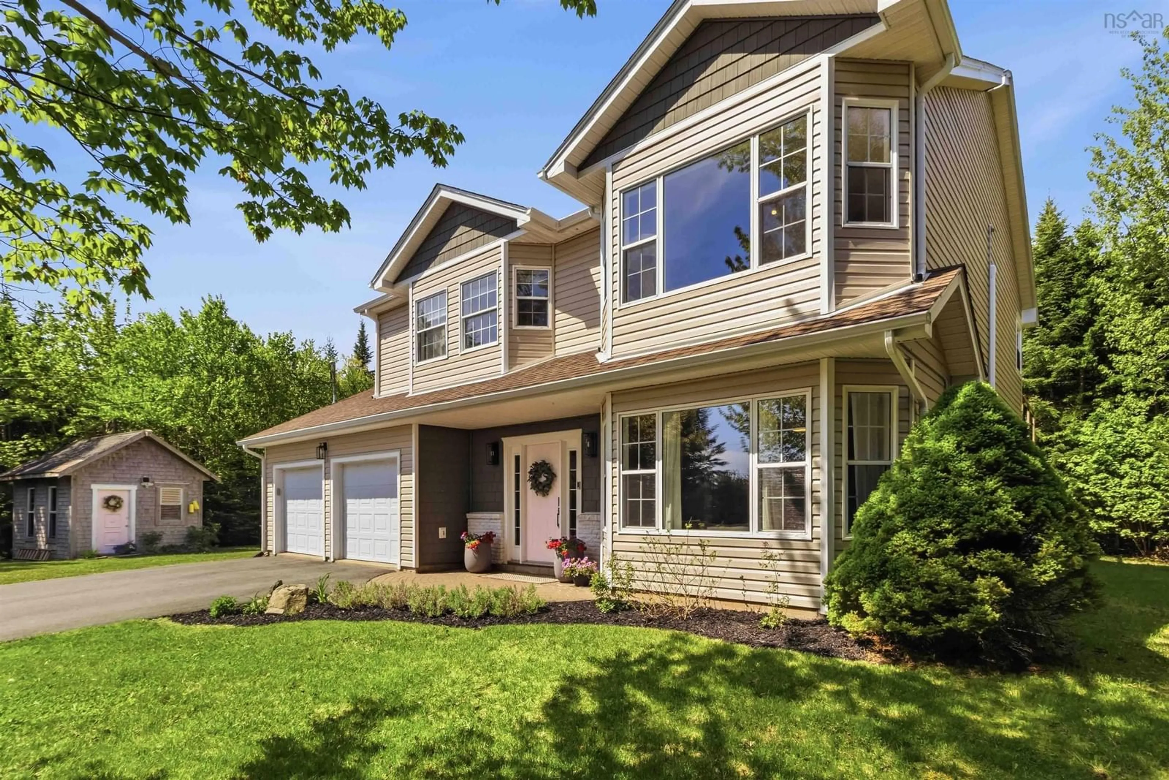 Home with vinyl exterior material, street for 326 Keltic Dr, Lawrencetown Nova Scotia B2Z 1M7