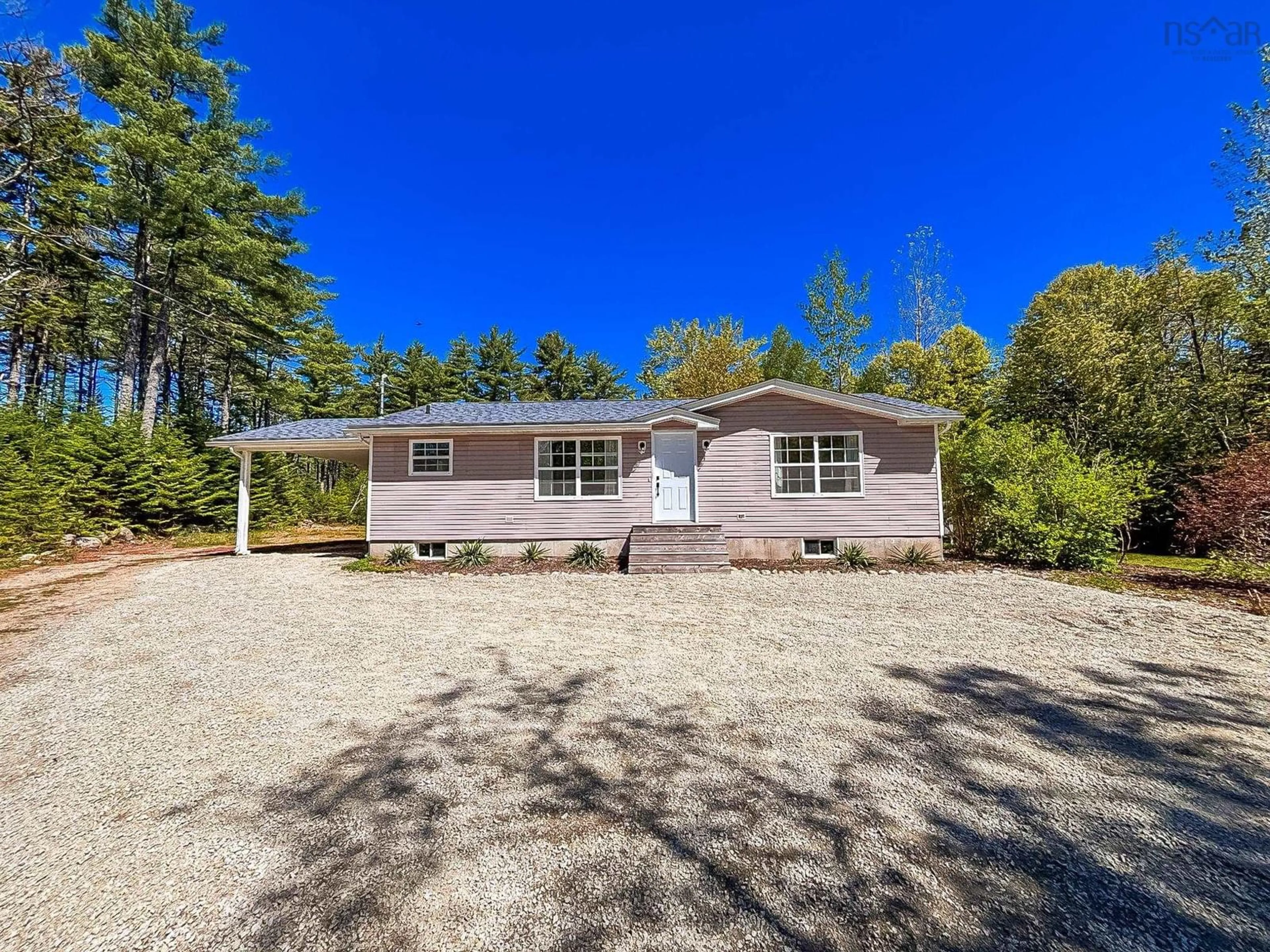 Home with vinyl exterior material, street for 7822 Highway 3, Martins River Nova Scotia B0J 2E0