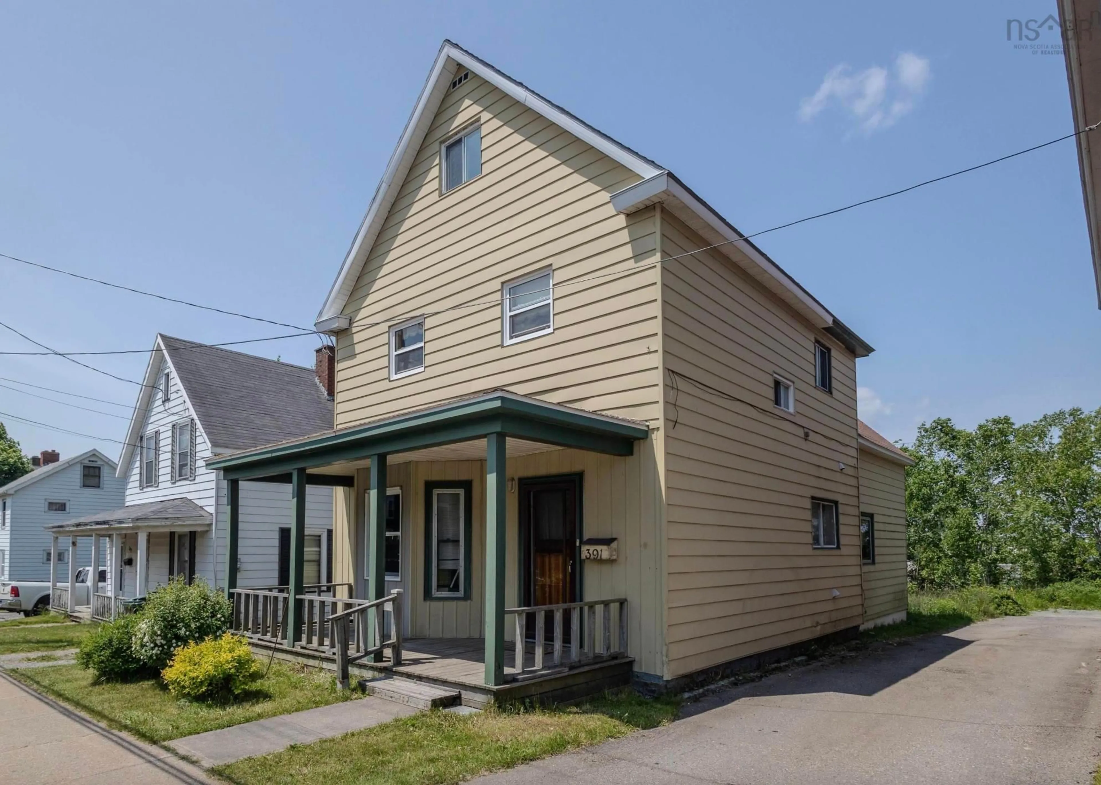 Home with vinyl exterior material, street for 391 Townsend St, Sydney Nova Scotia B1P 5G3