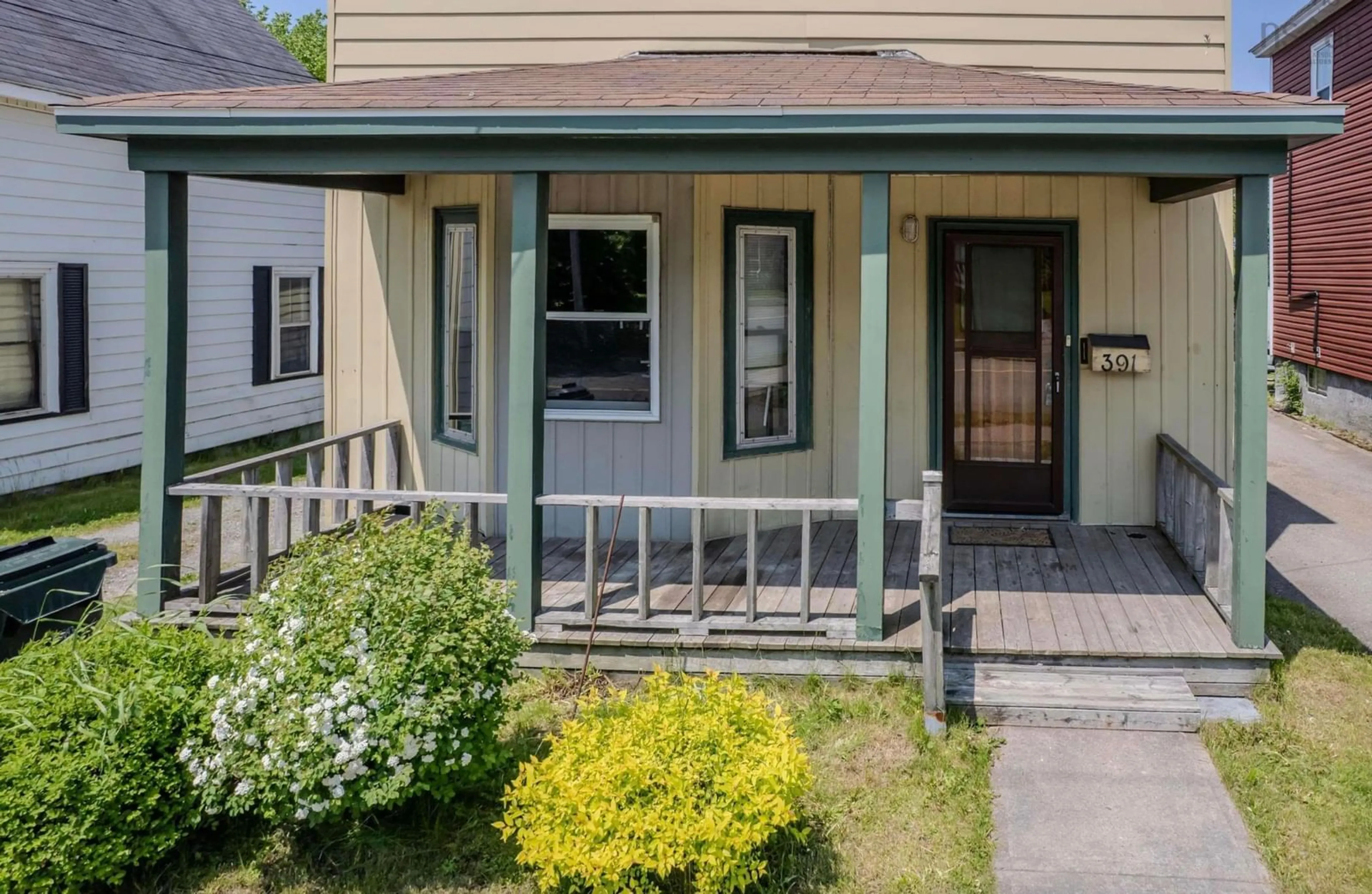 Home with vinyl exterior material, street for 391 Townsend St, Sydney Nova Scotia B1P 5G3