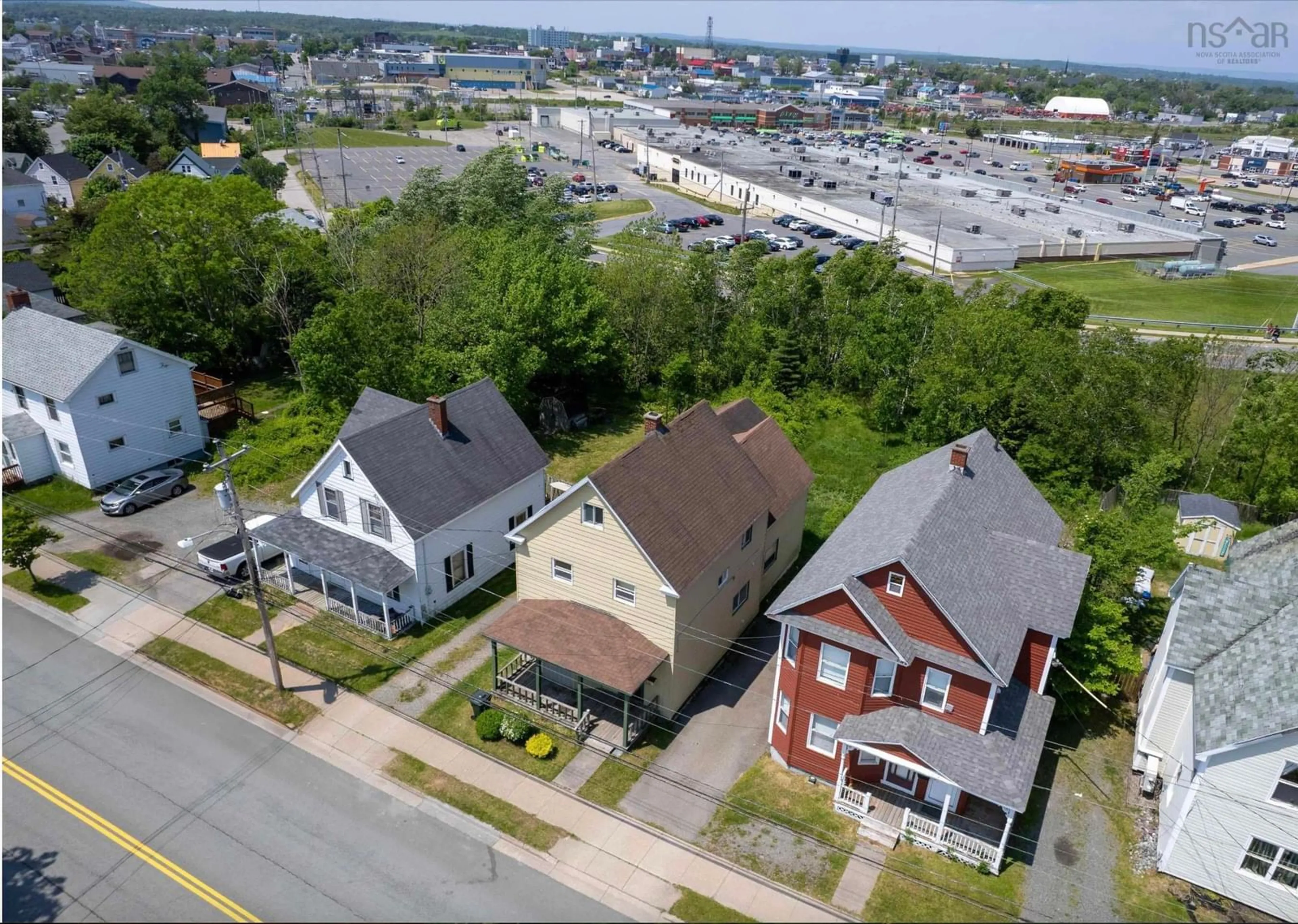 A pic from outside/outdoor area/front of a property/back of a property/a pic from drone, street for 391 Townsend St, Sydney Nova Scotia B1P 5G3