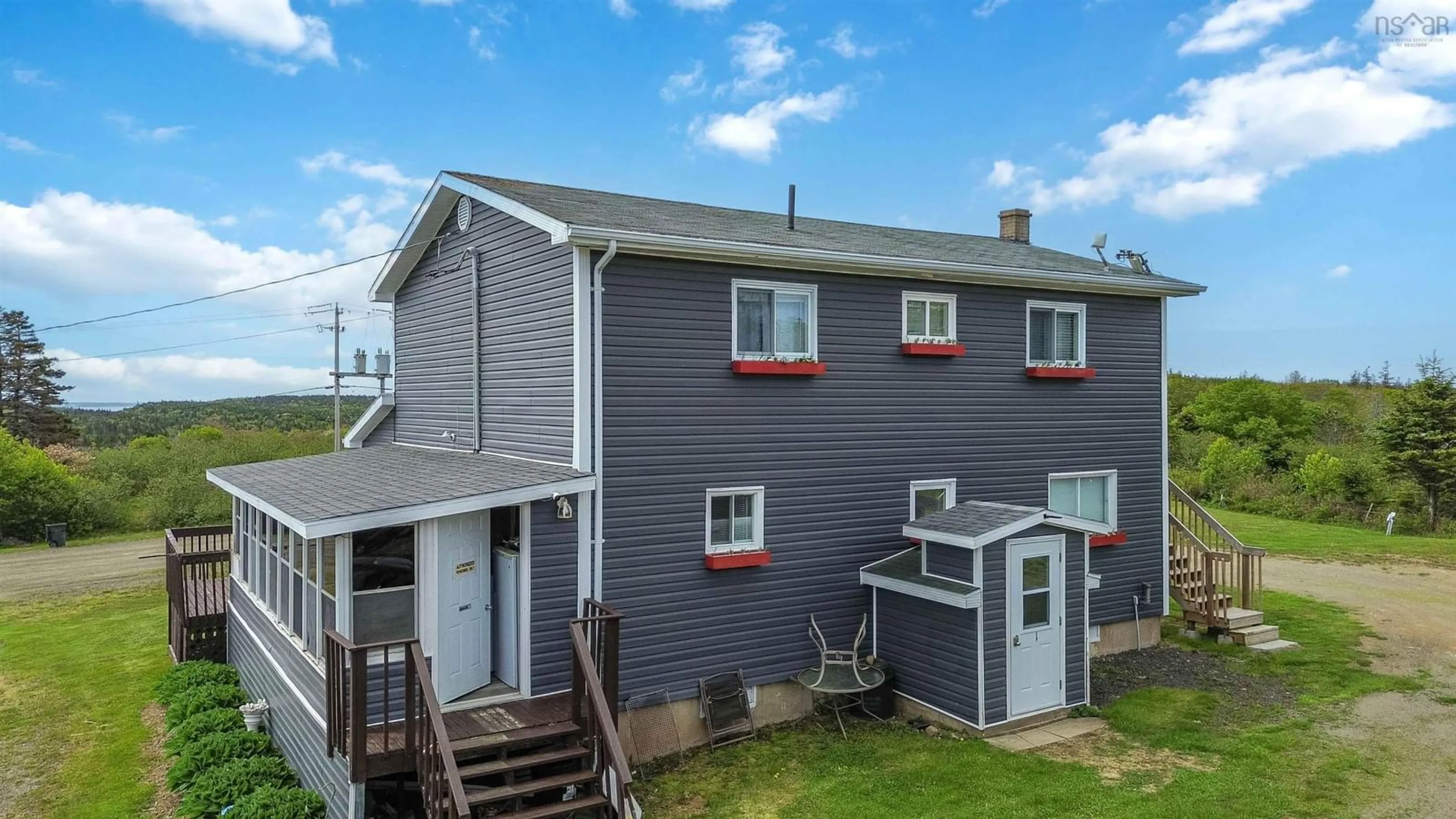 A pic from outside/outdoor area/front of a property/back of a property/a pic from drone, unknown for 50 Whale Cove Rd, Whale Cove Nova Scotia B0V 1E0