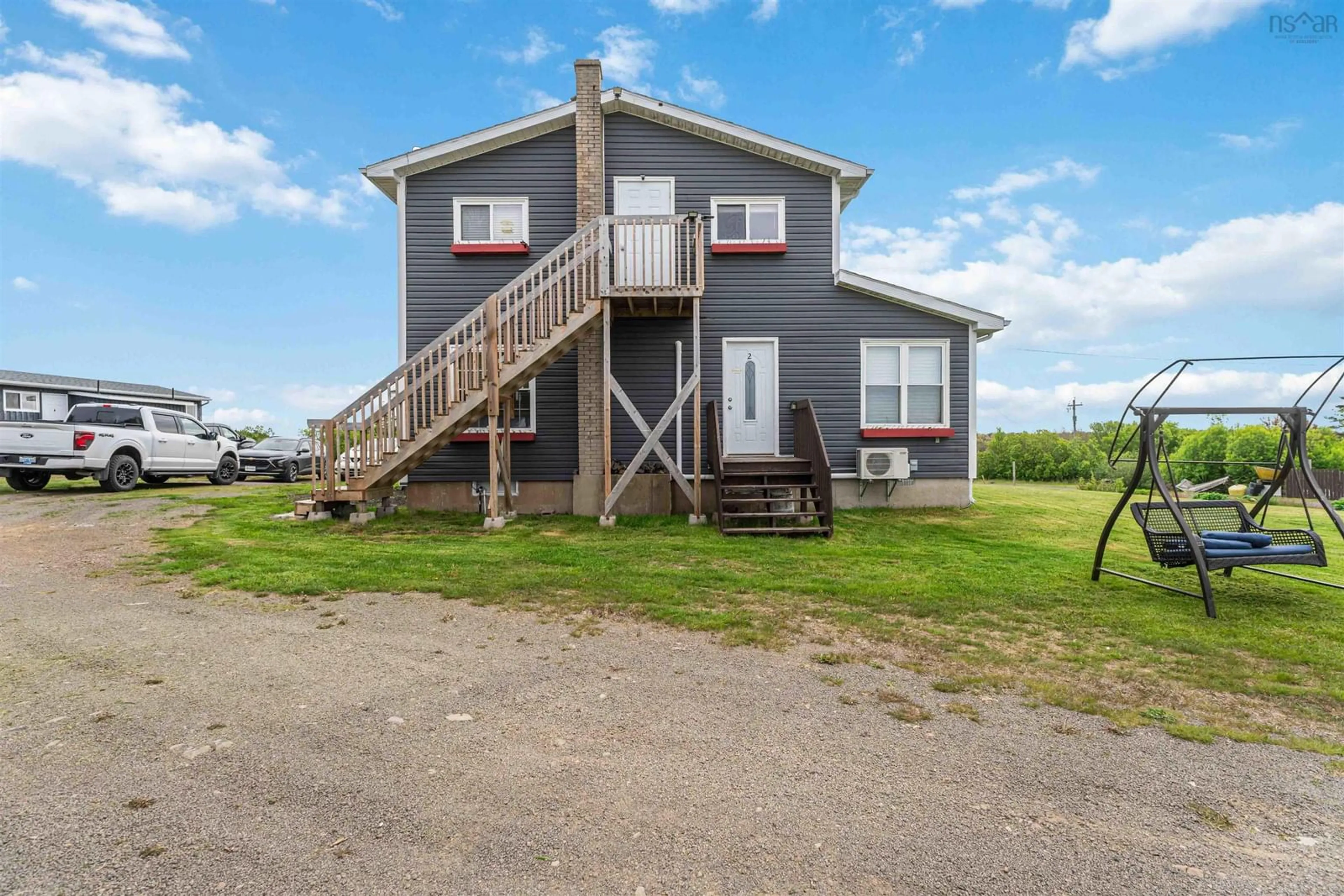 A pic from outside/outdoor area/front of a property/back of a property/a pic from drone, building for 50 Whale Cove Rd, Whale Cove Nova Scotia B0V 1E0