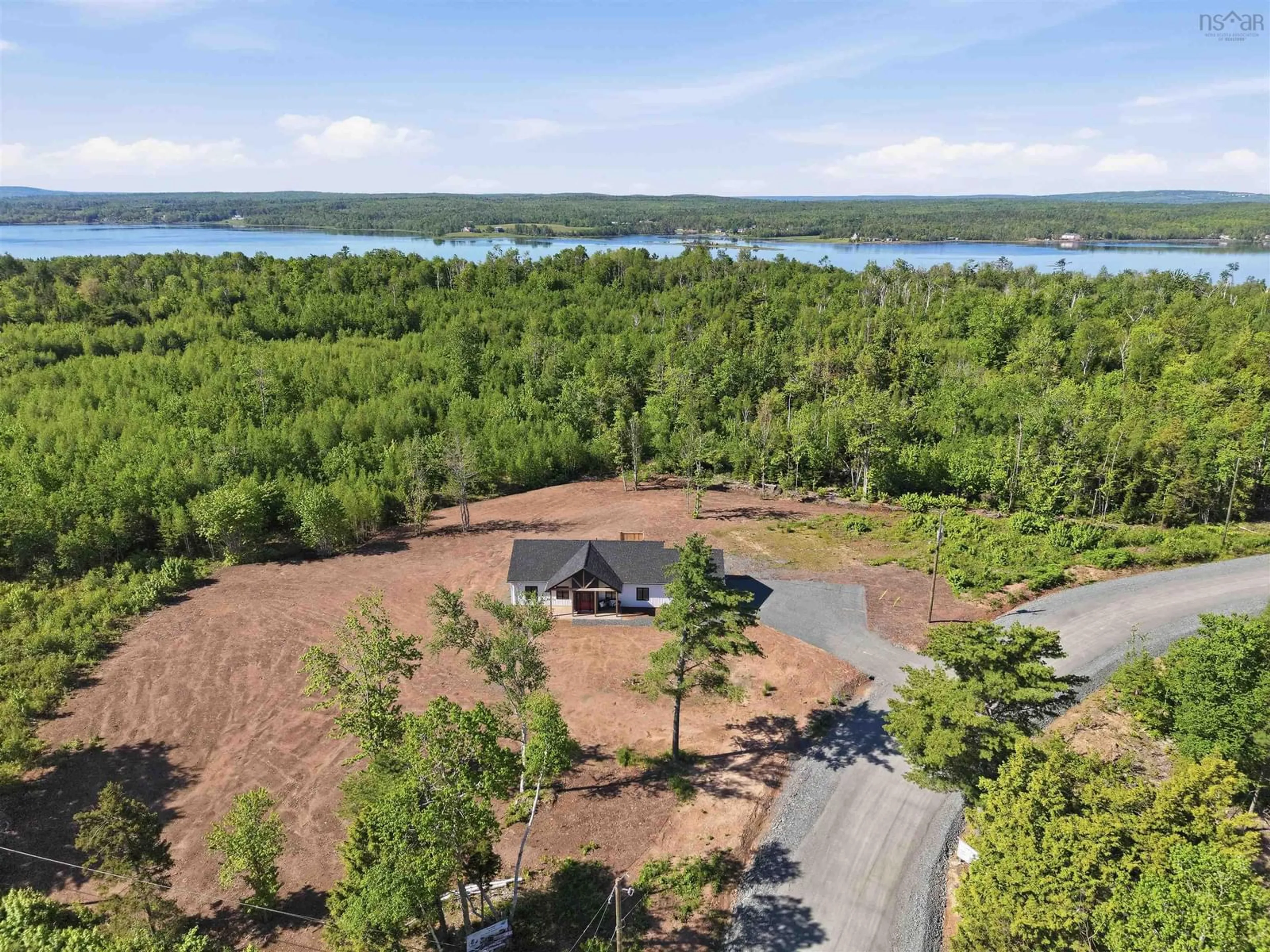 A pic from outside/outdoor area/front of a property/back of a property/a pic from drone, water/lake/river/ocean view for 9 Christison Lane, Pictou Landing Nova Scotia B0K 1X0