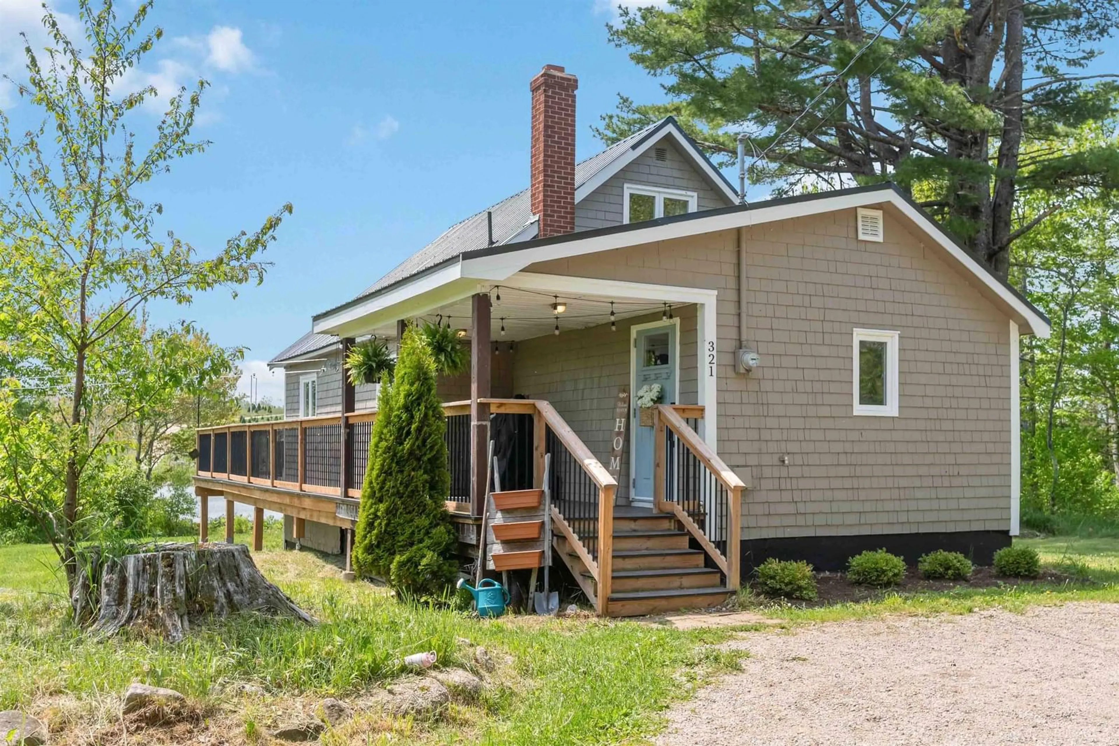 Home with vinyl exterior material, street for 321 Lake Ramsay Road, New Ross Nova Scotia B0J 2M0