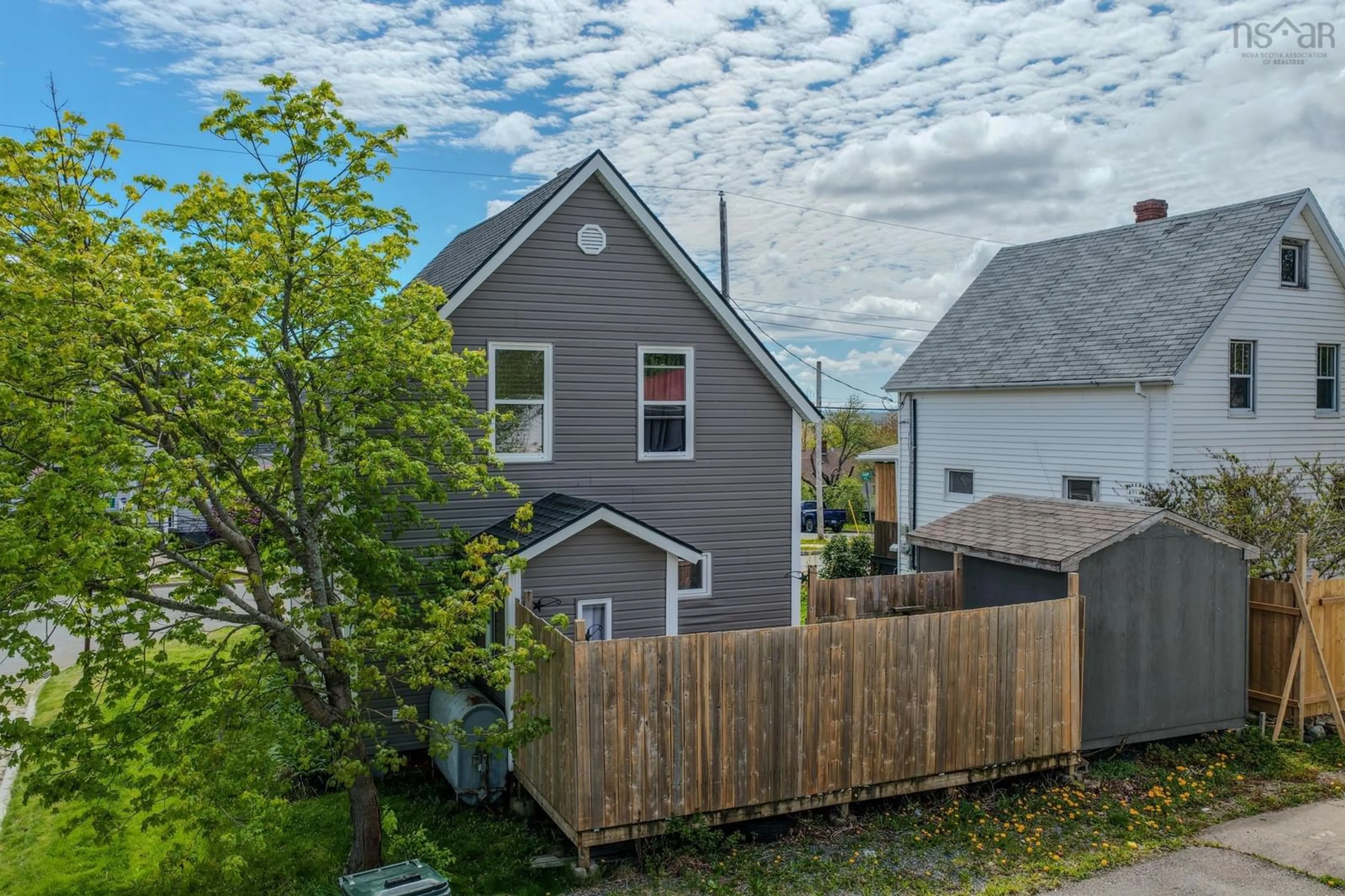 A pic from outside/outdoor area/front of a property/back of a property/a pic from drone, street for 195 Lisgard St, Sydney Nova Scotia B1P 2Y5