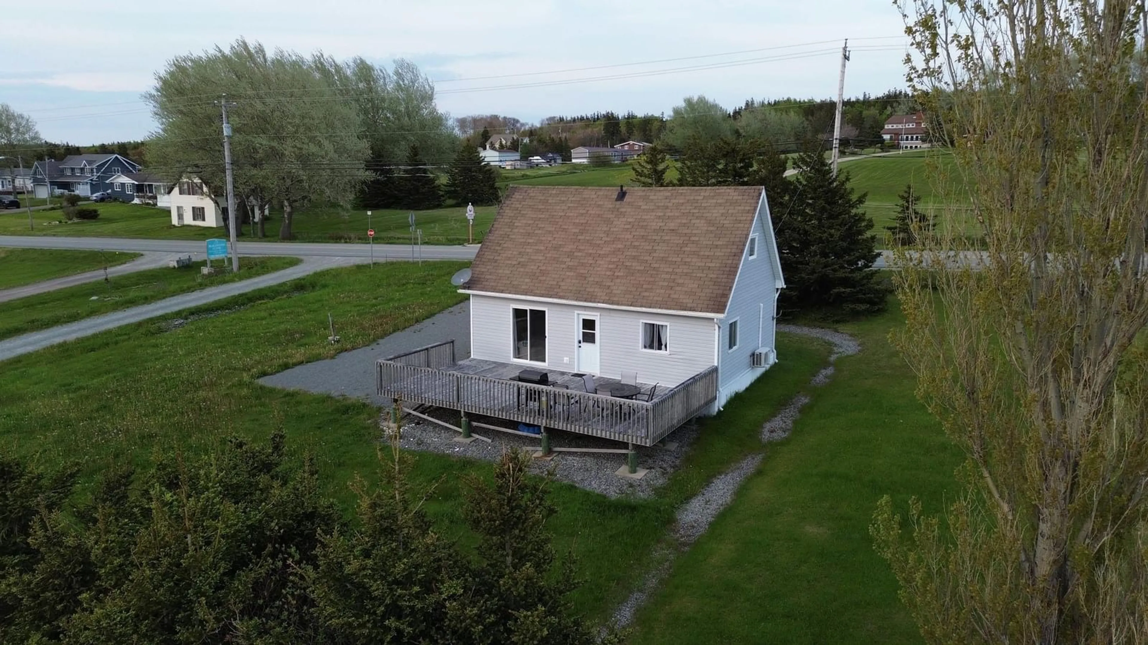 A pic from outside/outdoor area/front of a property/back of a property/a pic from drone, unknown for 8521 19 Hwy, Port Hood Nova Scotia B0E 2W0