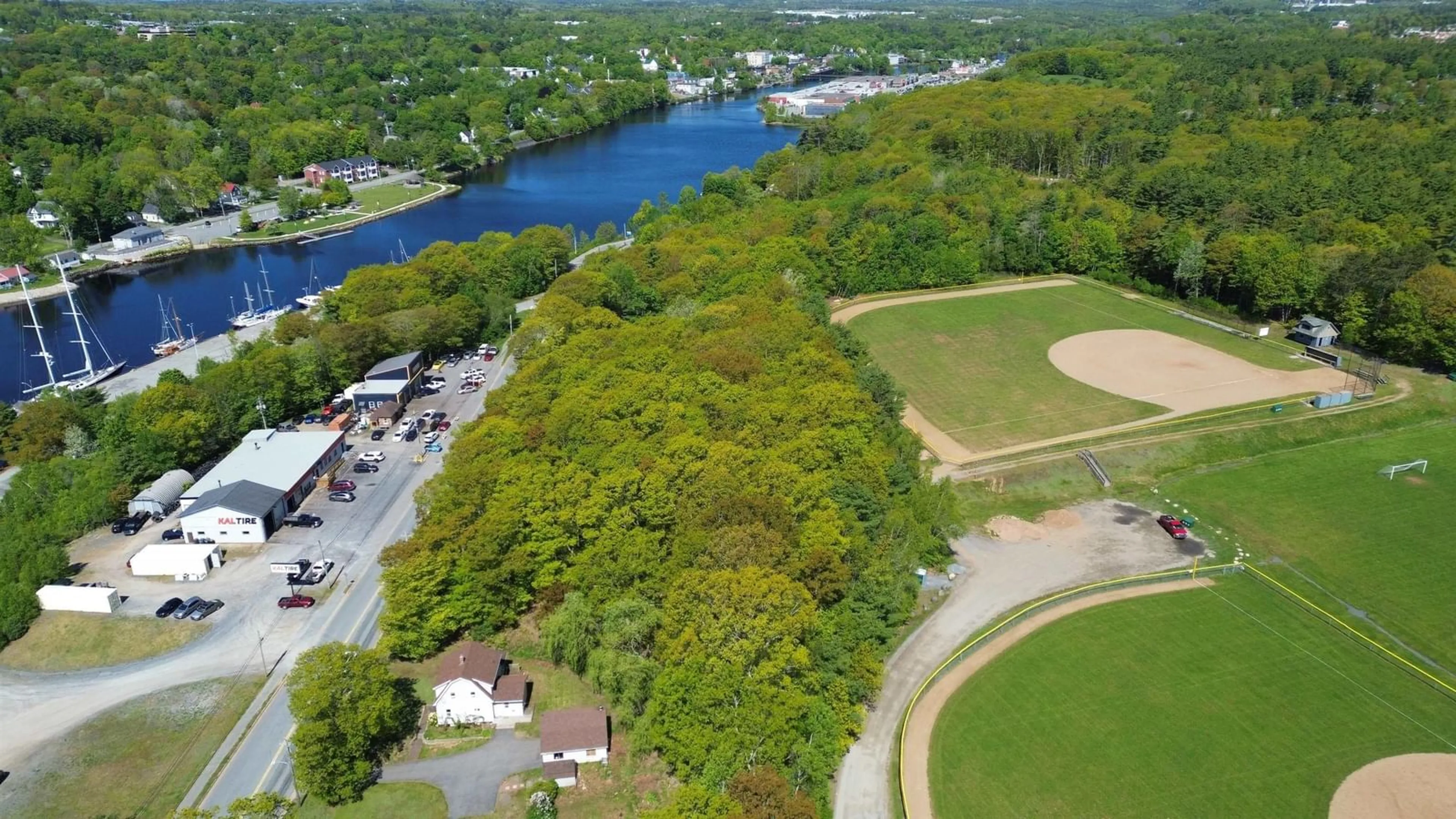 A pic from outside/outdoor area/front of a property/back of a property/a pic from drone, water/lake/river/ocean view for 114 Lahave St, Bridgewater Nova Scotia B4V 2T5