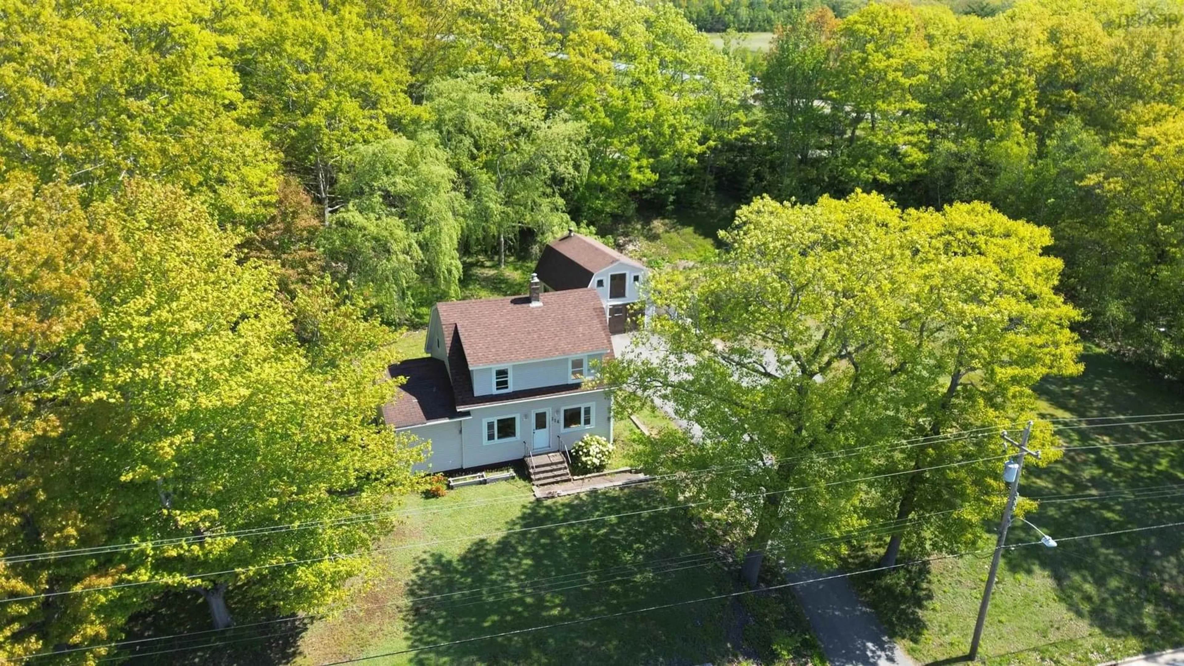 A pic from outside/outdoor area/front of a property/back of a property/a pic from drone, unknown for 114 Lahave St, Bridgewater Nova Scotia B4V 2T5