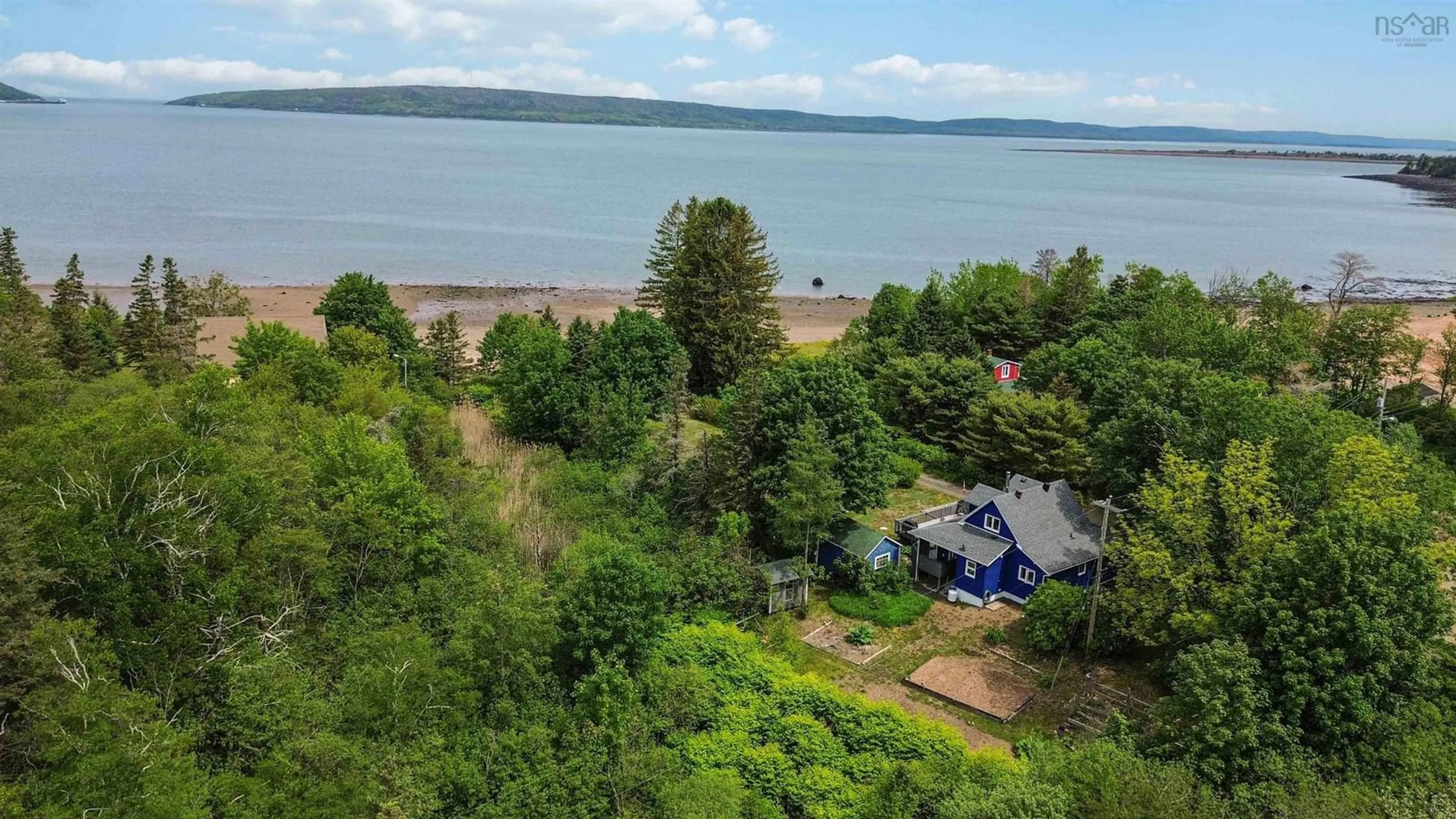 A pic from outside/outdoor area/front of a property/back of a property/a pic from drone, water/lake/river/ocean view for 85 Pettrie Rd, Smiths Cove Nova Scotia B0S 1S0