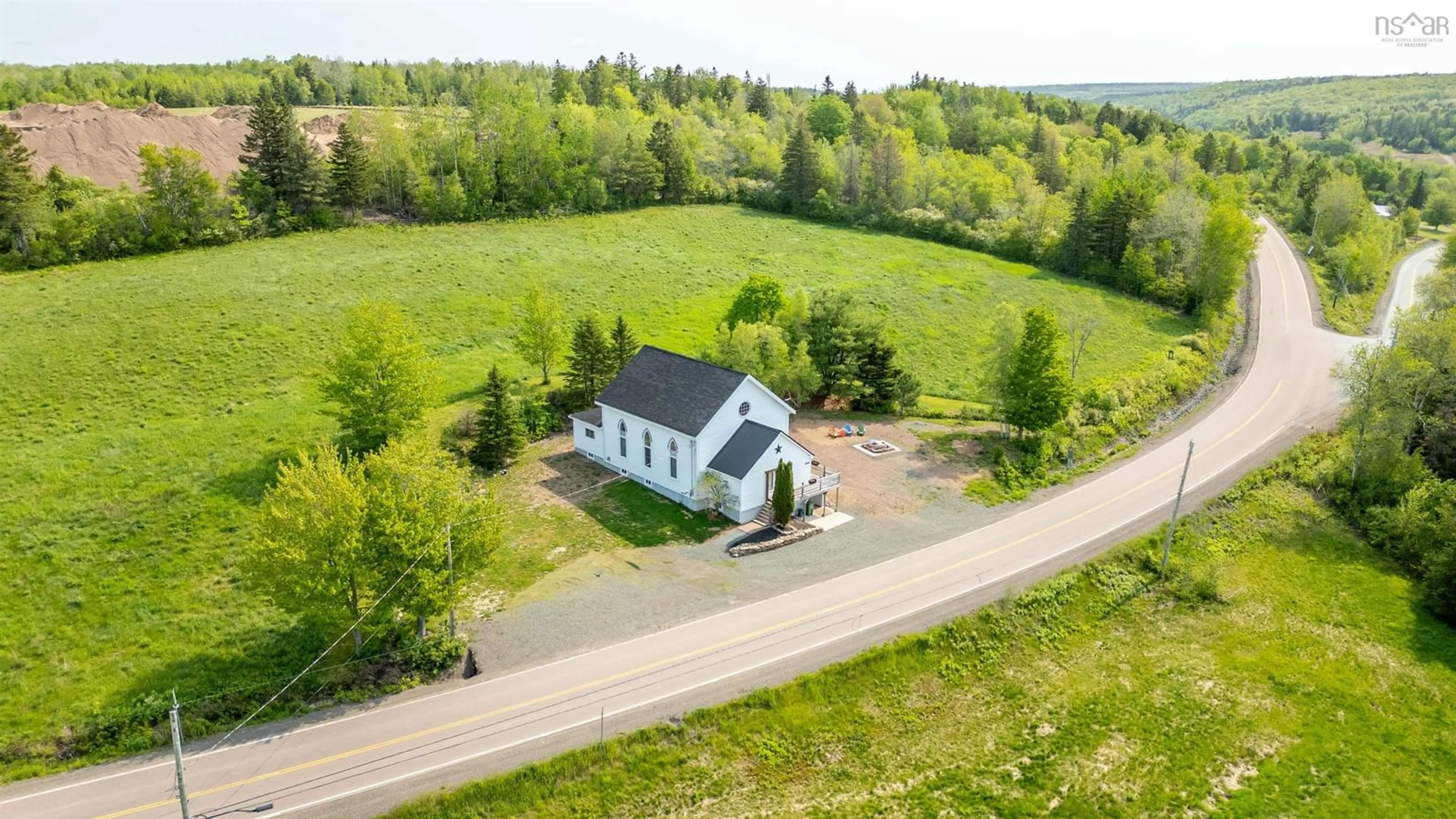 A pic from outside/outdoor area/front of a property/back of a property/a pic from drone, building for Highway 2 #10563, Mapleton Nova Scotia B0M 1W0