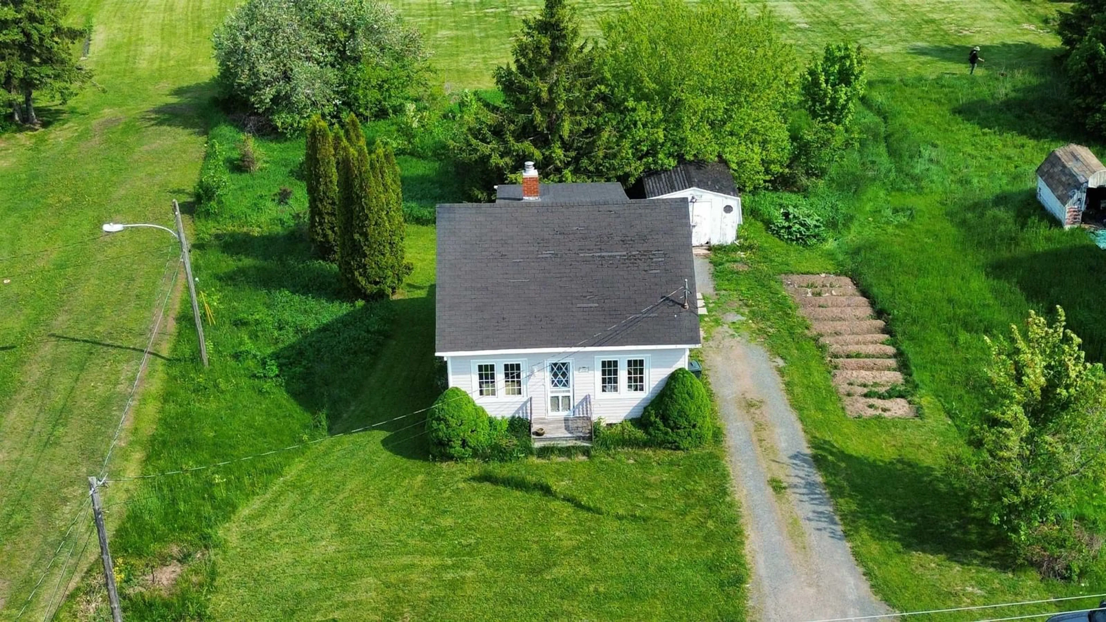 A pic from outside/outdoor area/front of a property/back of a property/a pic from drone, unknown for 40 Maple St, Springhill Nova Scotia B0M 1X0