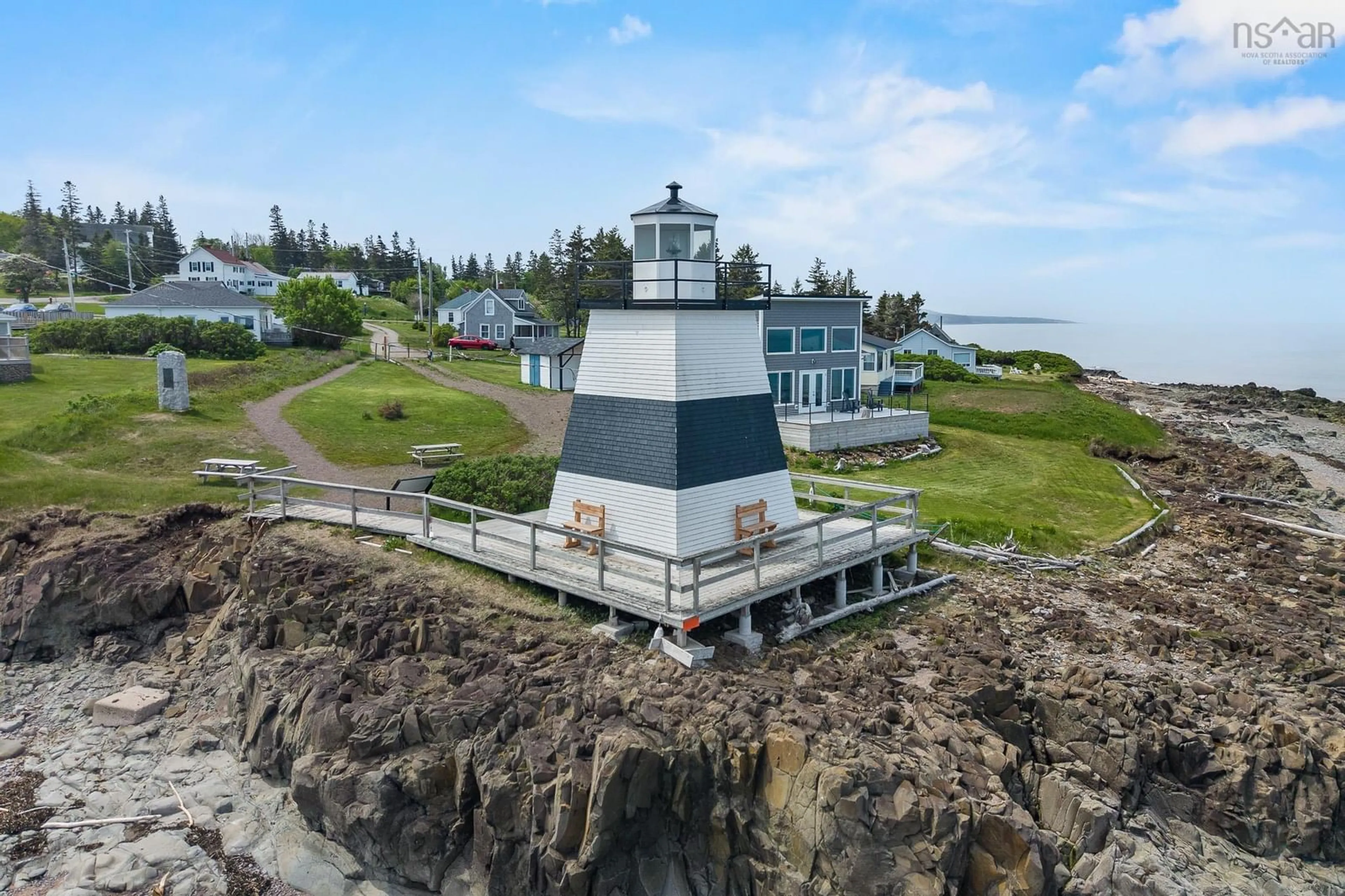 A pic from outside/outdoor area/front of a property/back of a property/a pic from drone, unknown for 17 Gordon Rd, Margaretsville Nova Scotia B0S 1N0