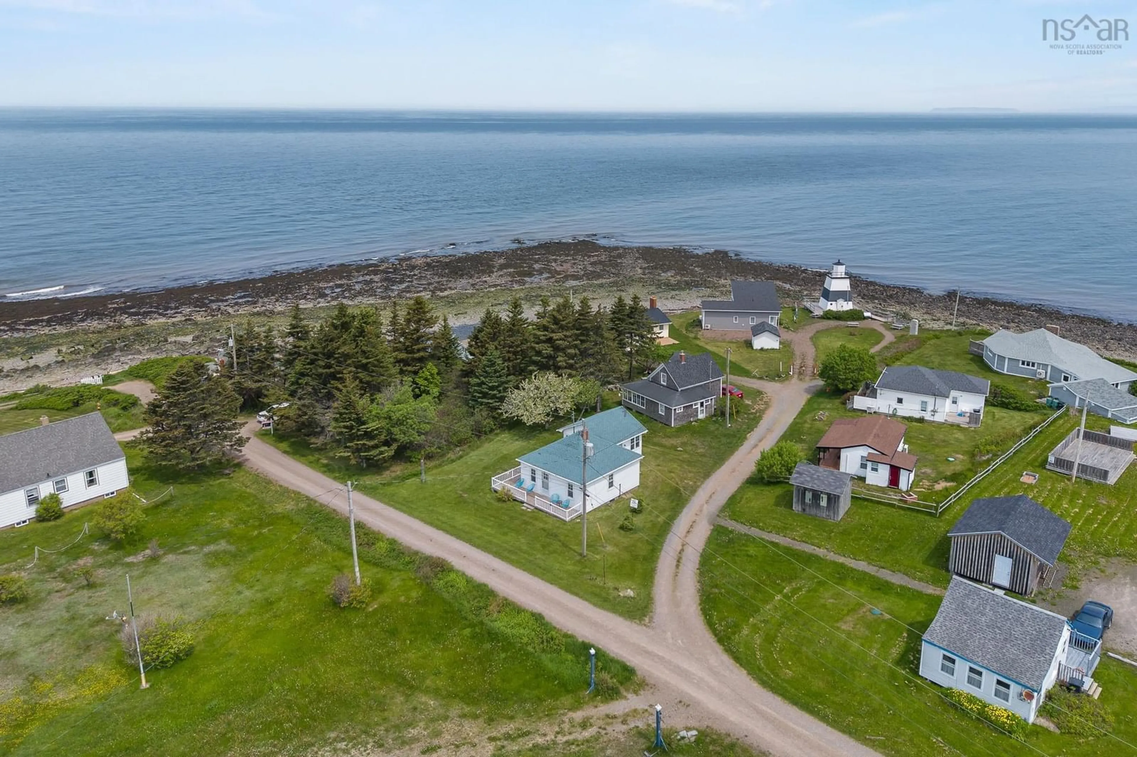 A pic from outside/outdoor area/front of a property/back of a property/a pic from drone, water/lake/river/ocean view for 17 Gordon Rd, Margaretsville Nova Scotia B0S 1N0