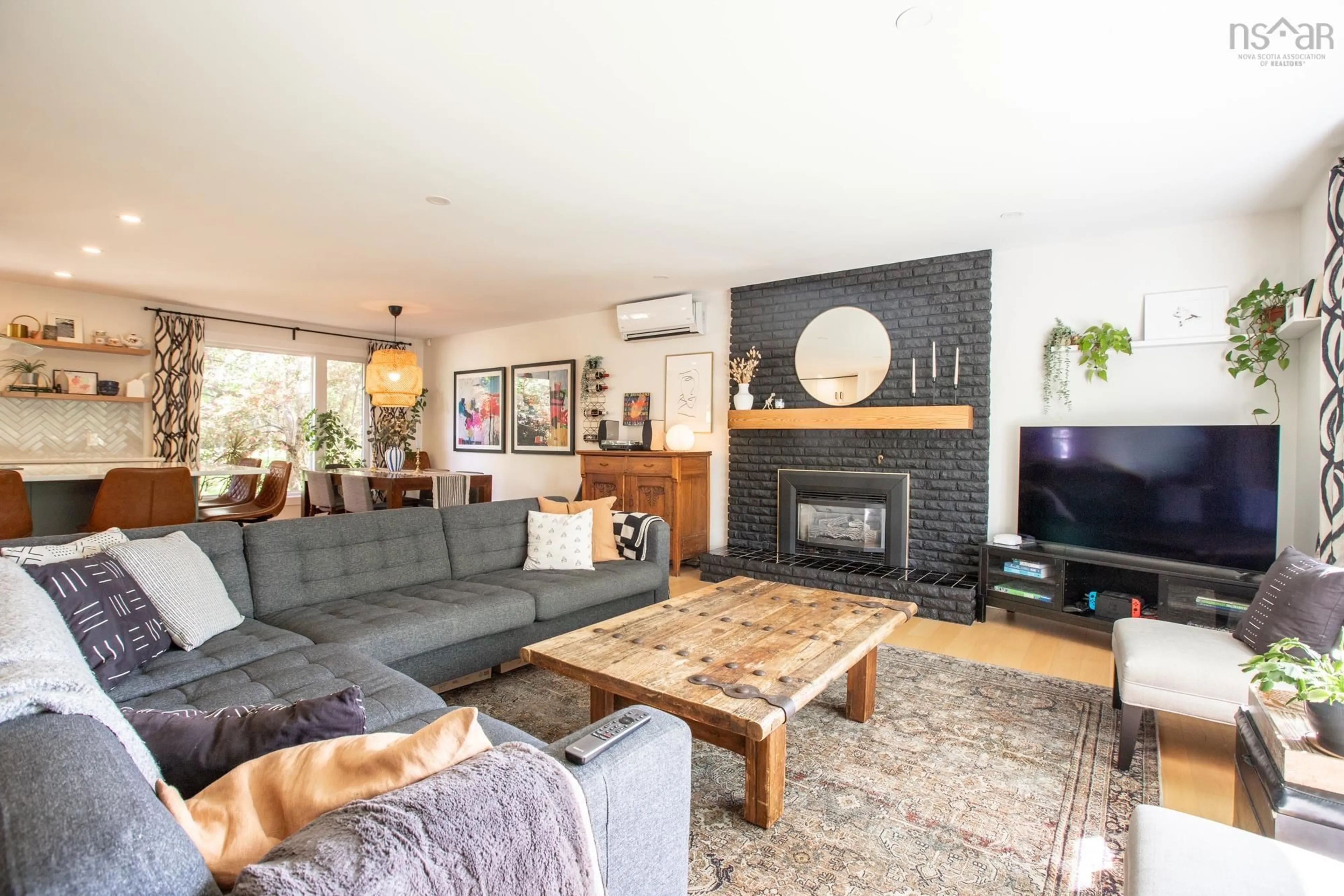 Living room with furniture, wood/laminate floor for 17 Hillwood Cres, Clayton Park Nova Scotia B3M 1J5