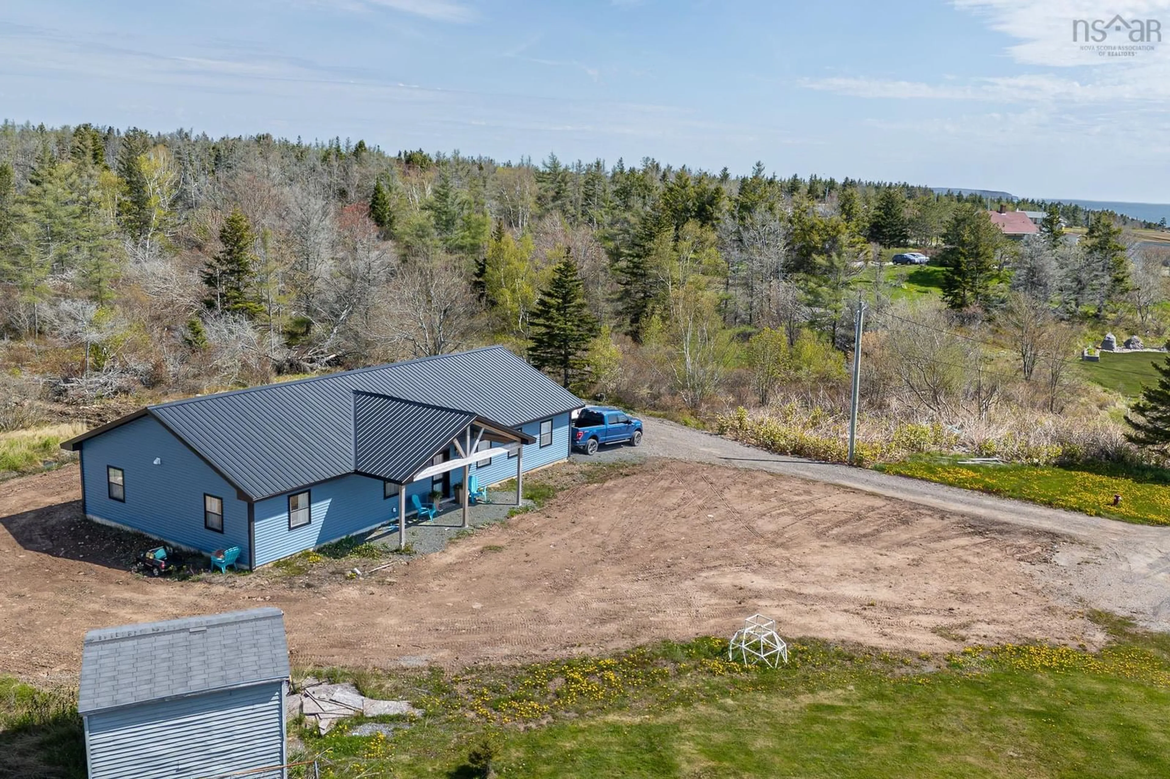 A pic from outside/outdoor area/front of a property/back of a property/a pic from drone, unknown for 29 Amy St, Port Morien Nova Scotia B1A 1A1