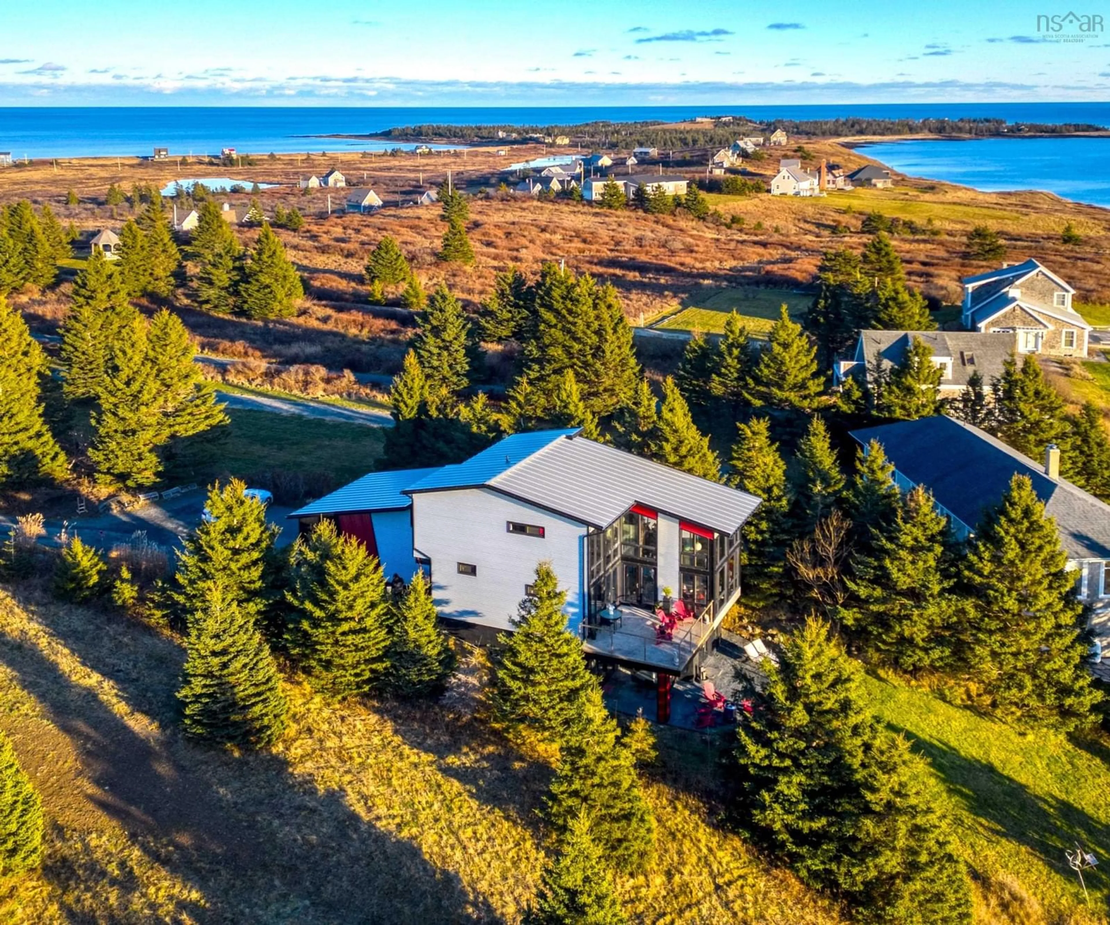 A pic from outside/outdoor area/front of a property/back of a property/a pic from drone, water/lake/river/ocean view for 66 Beach Hill Rd, Kingsburg Nova Scotia B0J 2X0