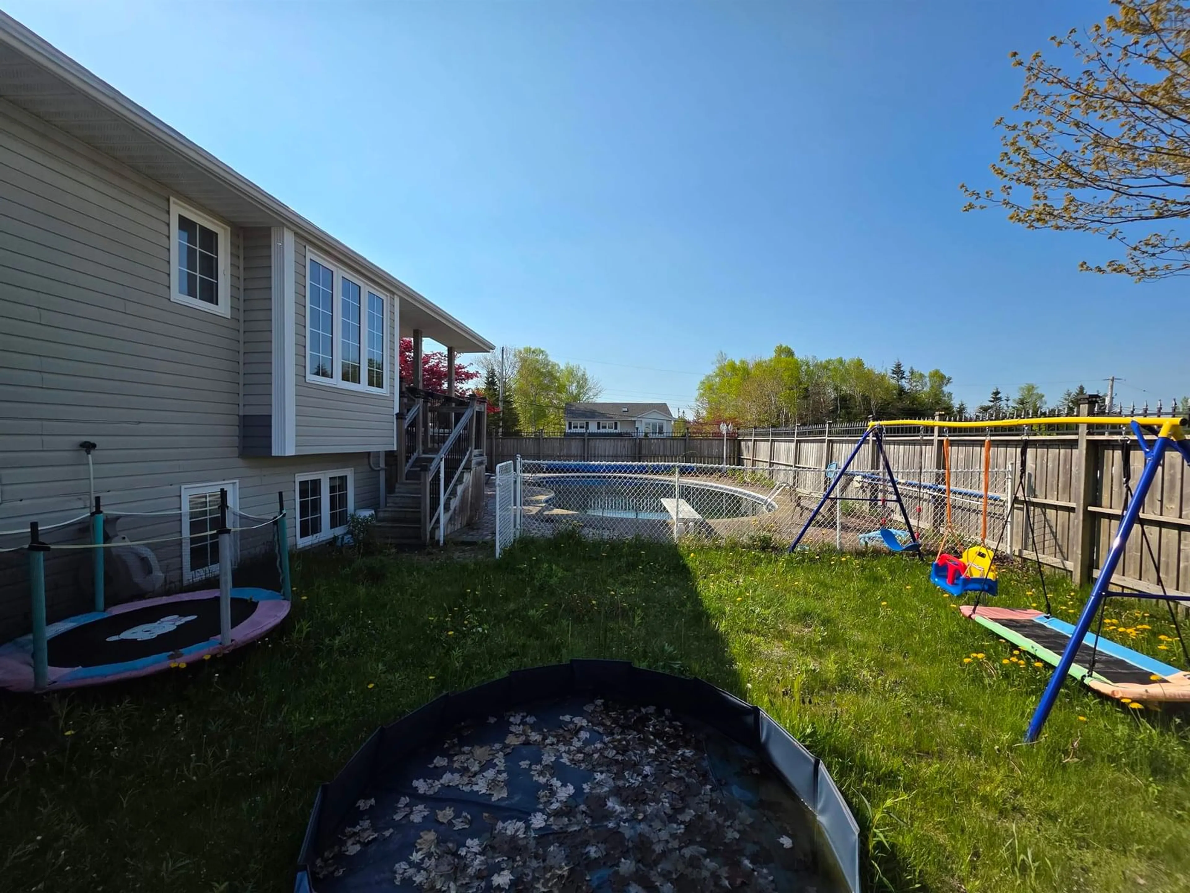 A pic from outside/outdoor area/front of a property/back of a property/a pic from drone, water/lake/river/ocean view for 54 Englewood Cres, Sydney River Nova Scotia B1S 3V2
