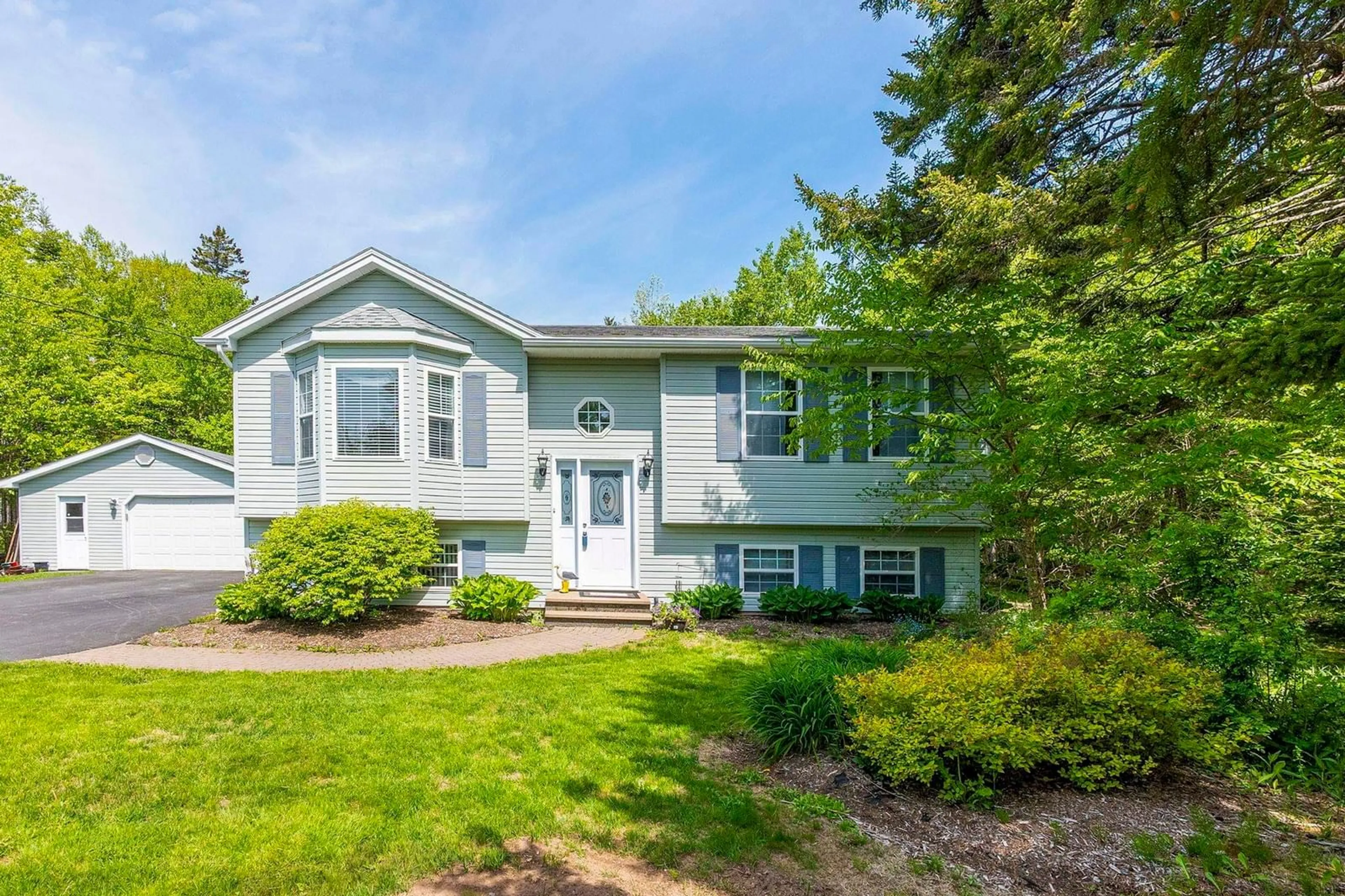 Home with vinyl exterior material, street for 18 Weaver Crt, Hammonds Plains Nova Scotia B3Z 1K9