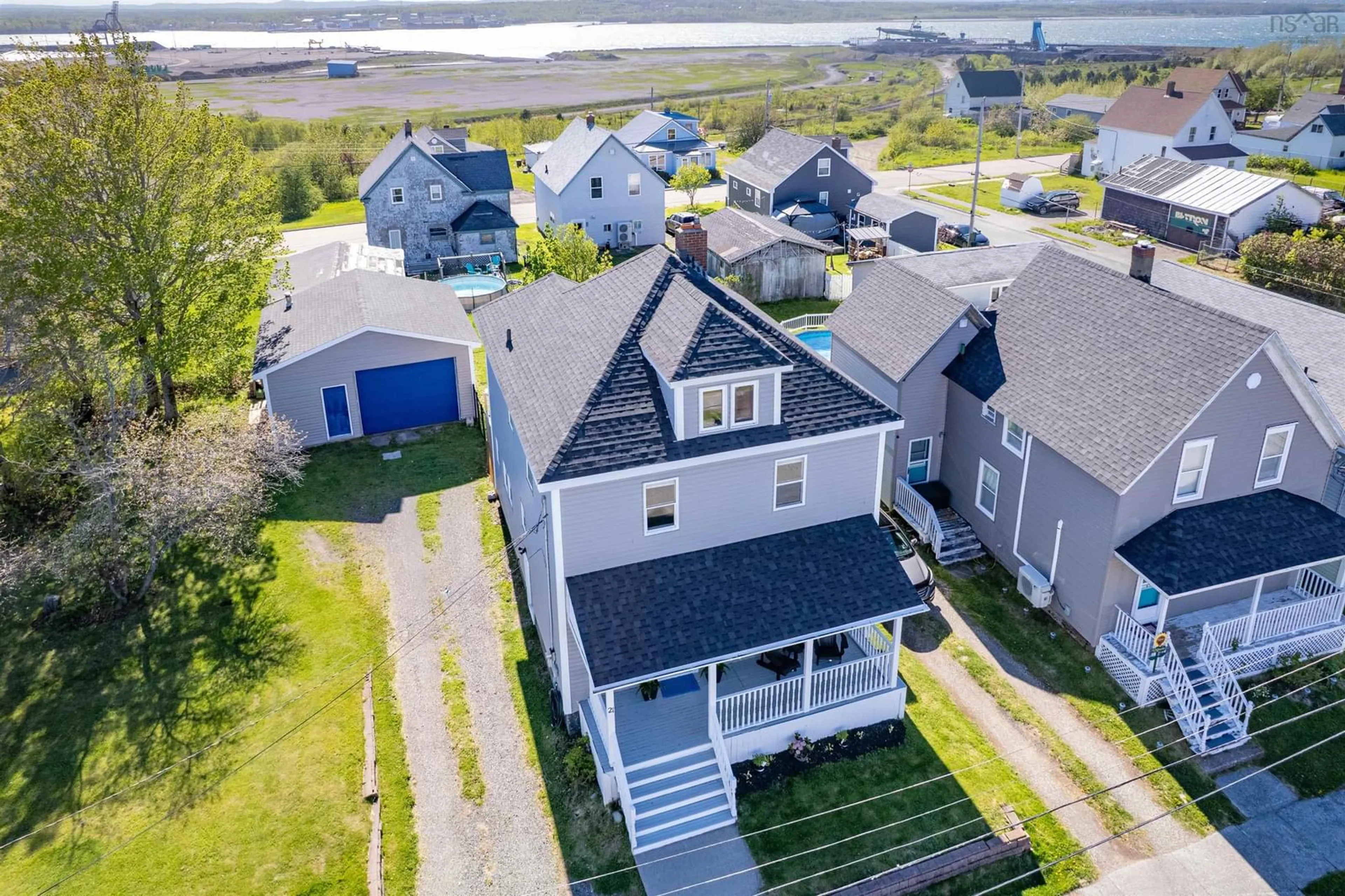 A pic from outside/outdoor area/front of a property/back of a property/a pic from drone, water/lake/river/ocean view for 21 Cameron St, Whitney Pier Nova Scotia B1N 1E2