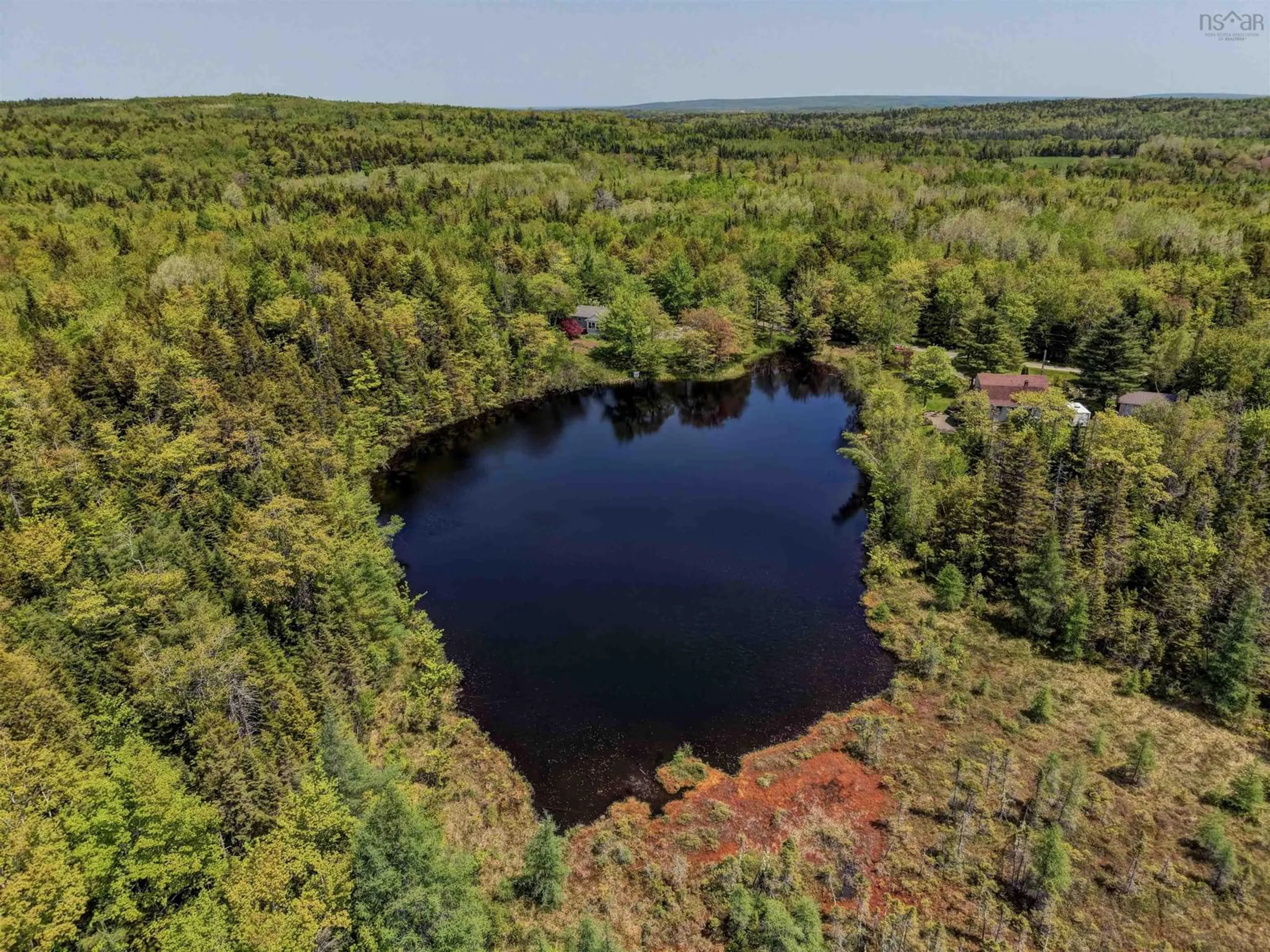 A pic from outside/outdoor area/front of a property/back of a property/a pic from drone, water/lake/river/ocean view for 99 Gloria Lane, Carrolls Corner Nova Scotia B0N 1Y0
