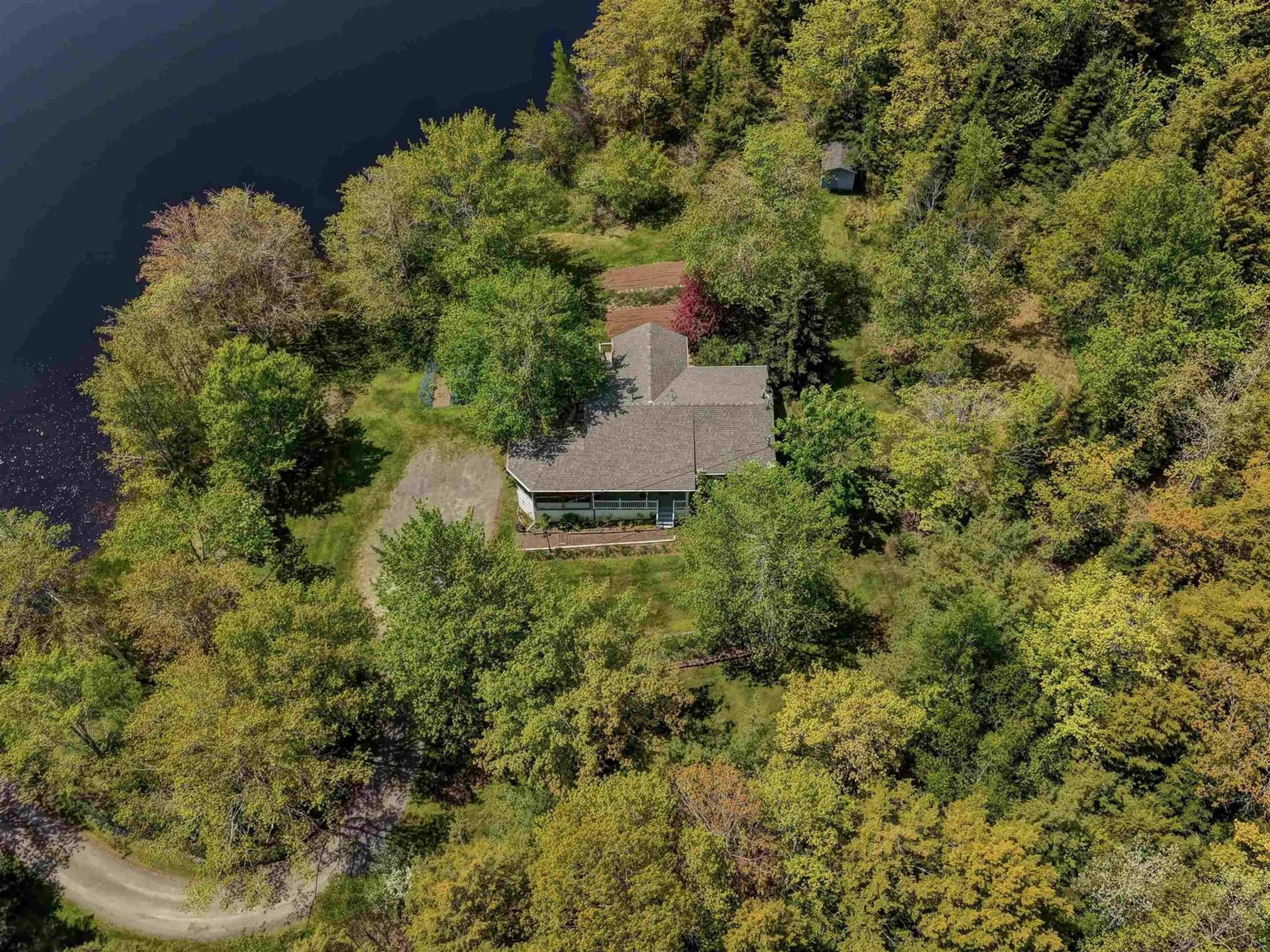 A pic from outside/outdoor area/front of a property/back of a property/a pic from drone, water/lake/river/ocean view for 99 Gloria Lane, Carrolls Corner Nova Scotia B0N 1Y0
