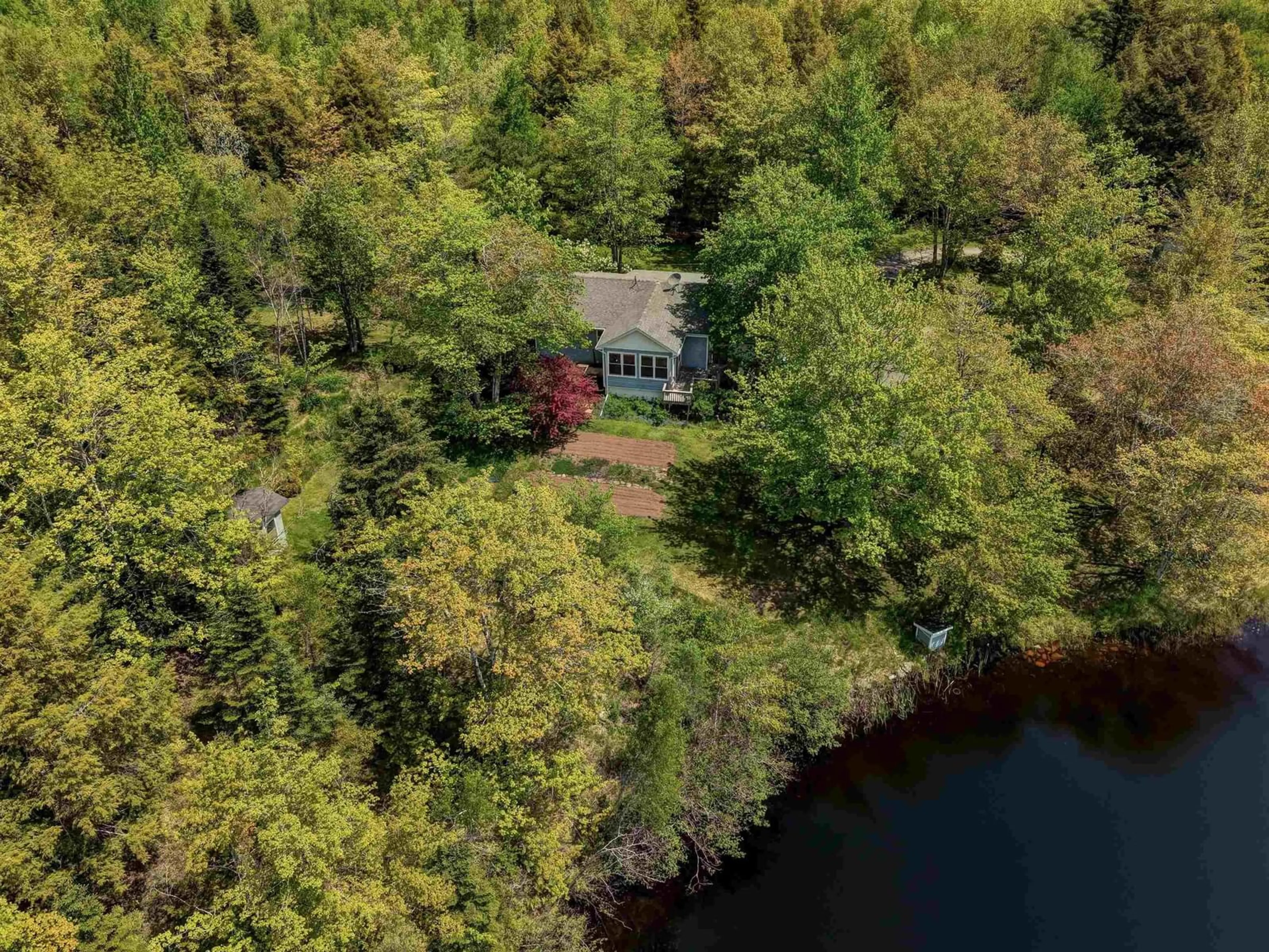 A pic from outside/outdoor area/front of a property/back of a property/a pic from drone, water/lake/river/ocean view for 99 Gloria Lane, Carrolls Corner Nova Scotia B0N 1Y0