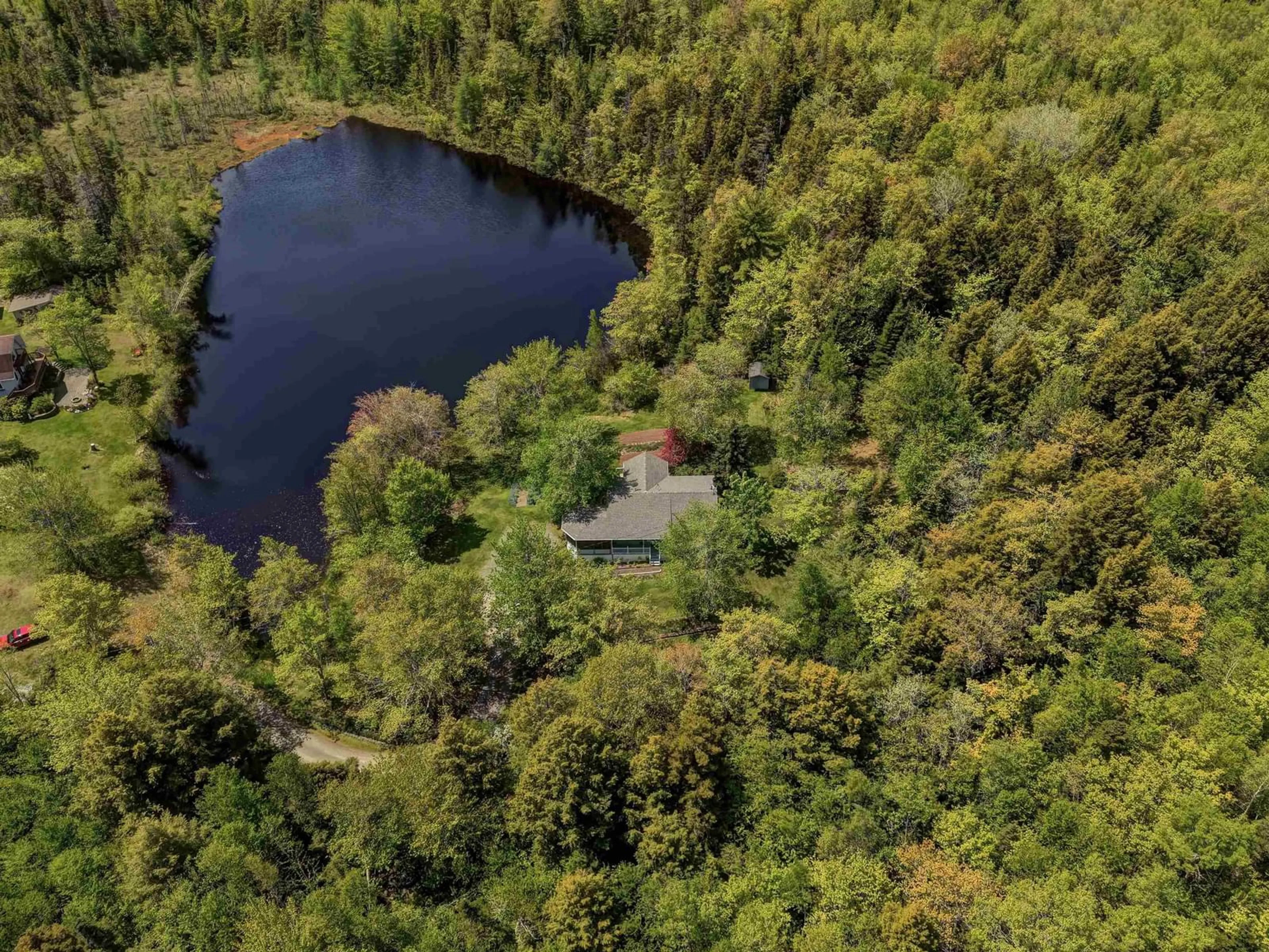 A pic from outside/outdoor area/front of a property/back of a property/a pic from drone, water/lake/river/ocean view for 99 Gloria Lane, Carrolls Corner Nova Scotia B0N 1Y0