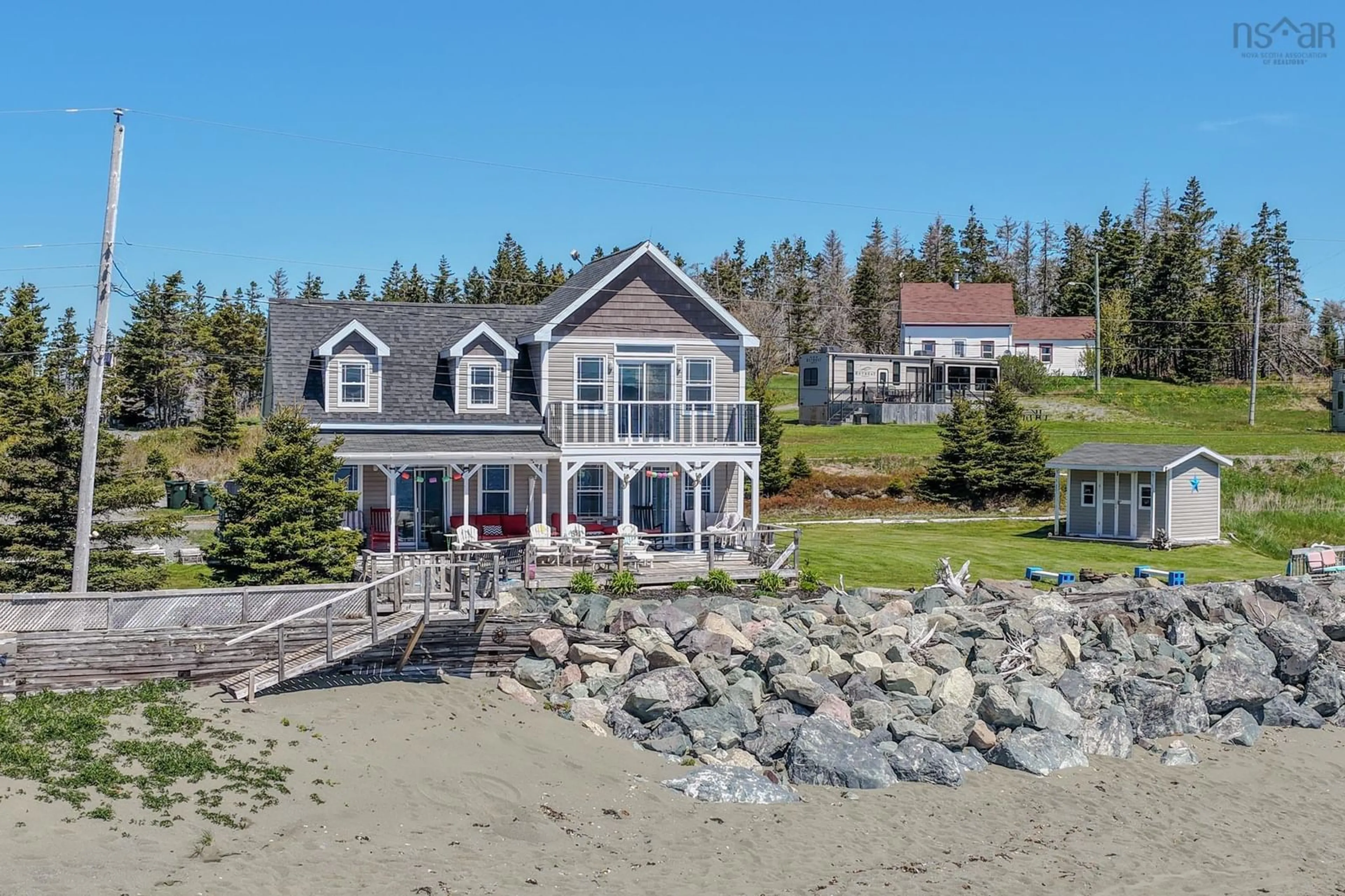 A pic from outside/outdoor area/front of a property/back of a property/a pic from drone, water/lake/river/ocean view for 104 Rouse Island Rd, Gabarus Nova Scotia B1K 3T6