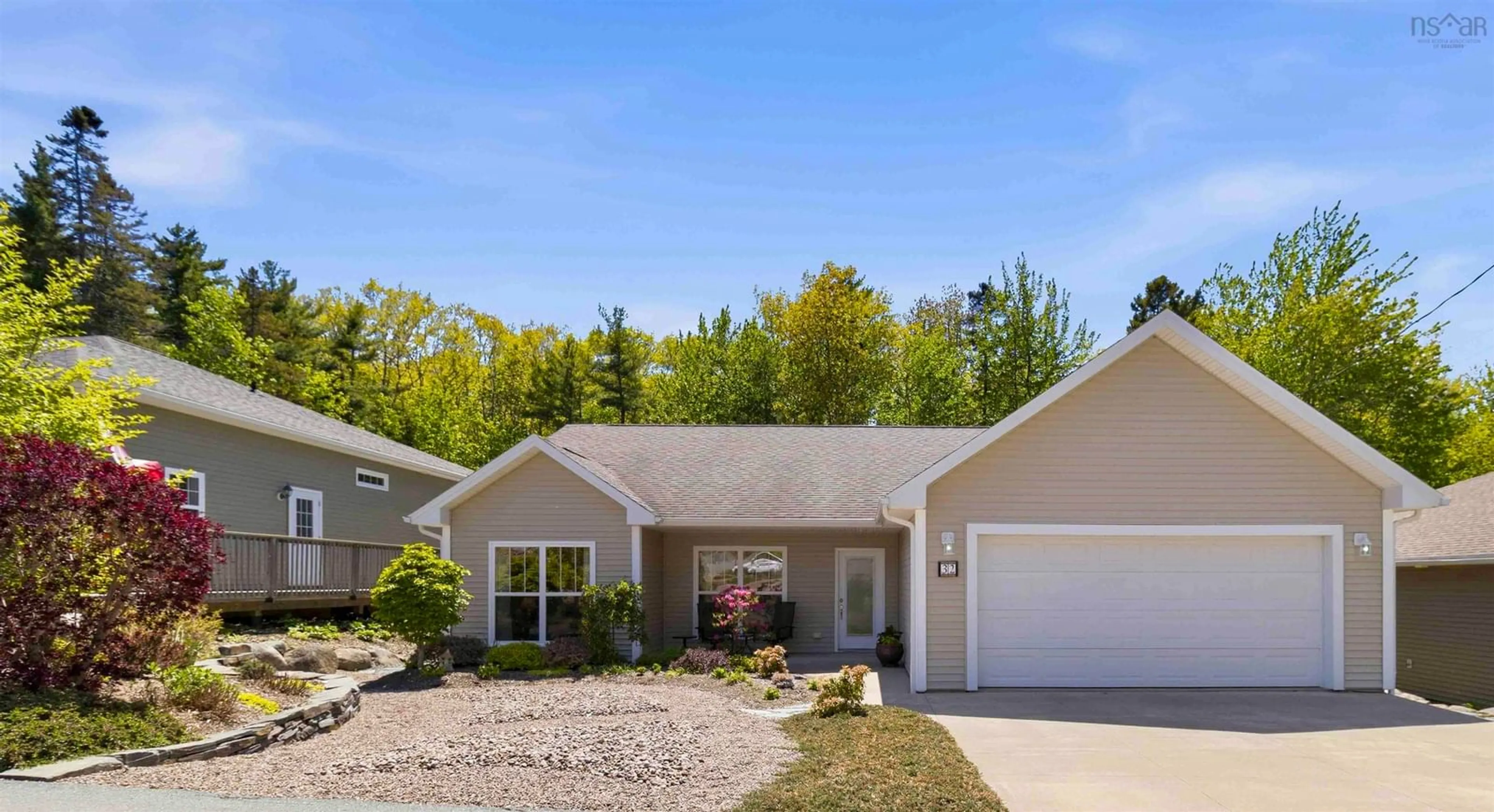 Home with vinyl exterior material, street for 32 Roundhouse Dr, Bridgewater Nova Scotia B4V 9A9