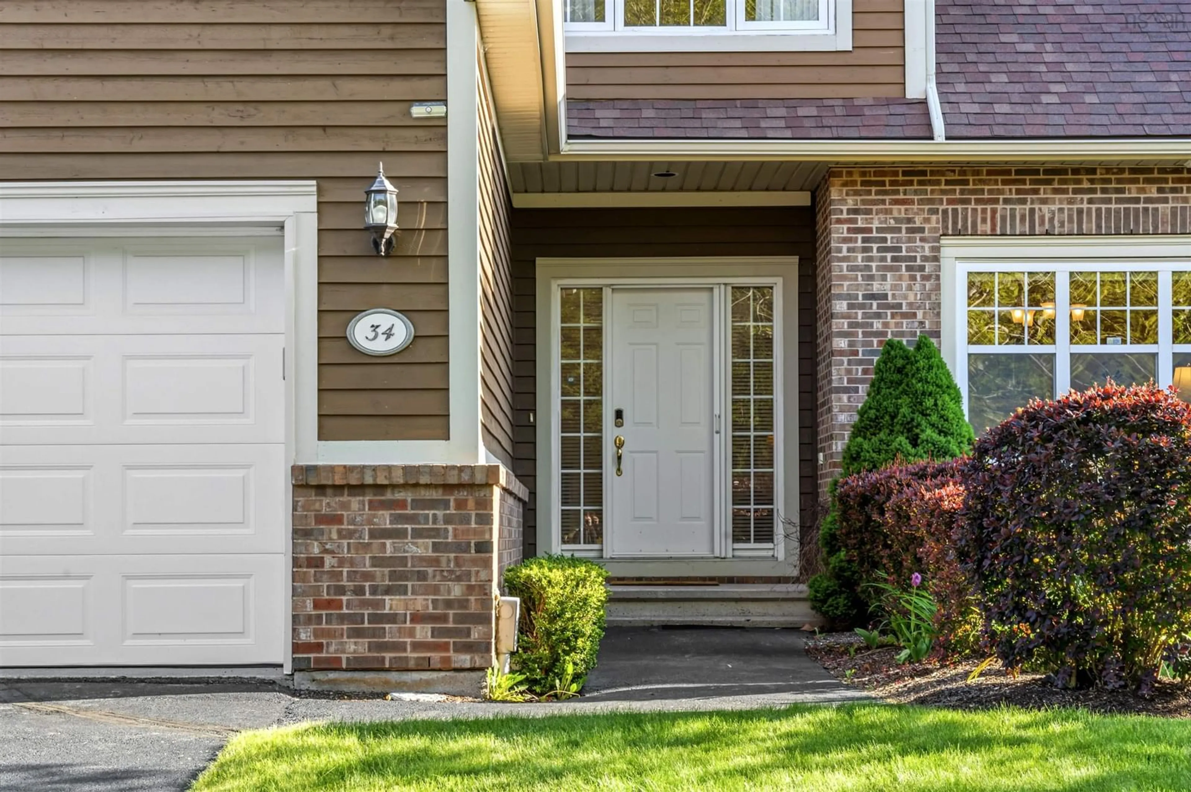Home with brick exterior material, street for 34 Greenside Lane, Hammonds Plains Nova Scotia B4B 2A1