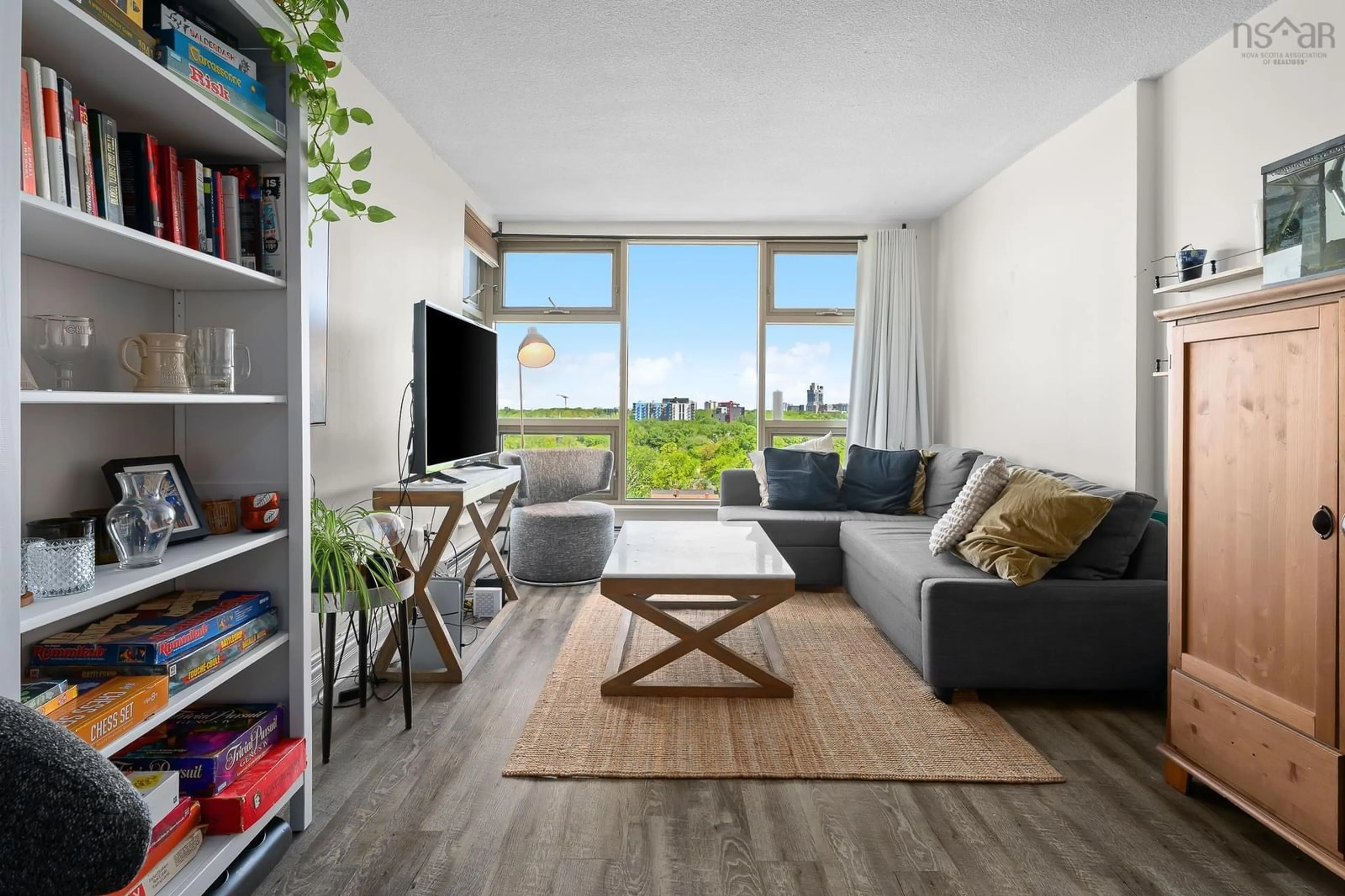 Living room with furniture, wood/laminate floor for 6369 Coburg Rd #1108, Halifax Nova Scotia B3H 4J7