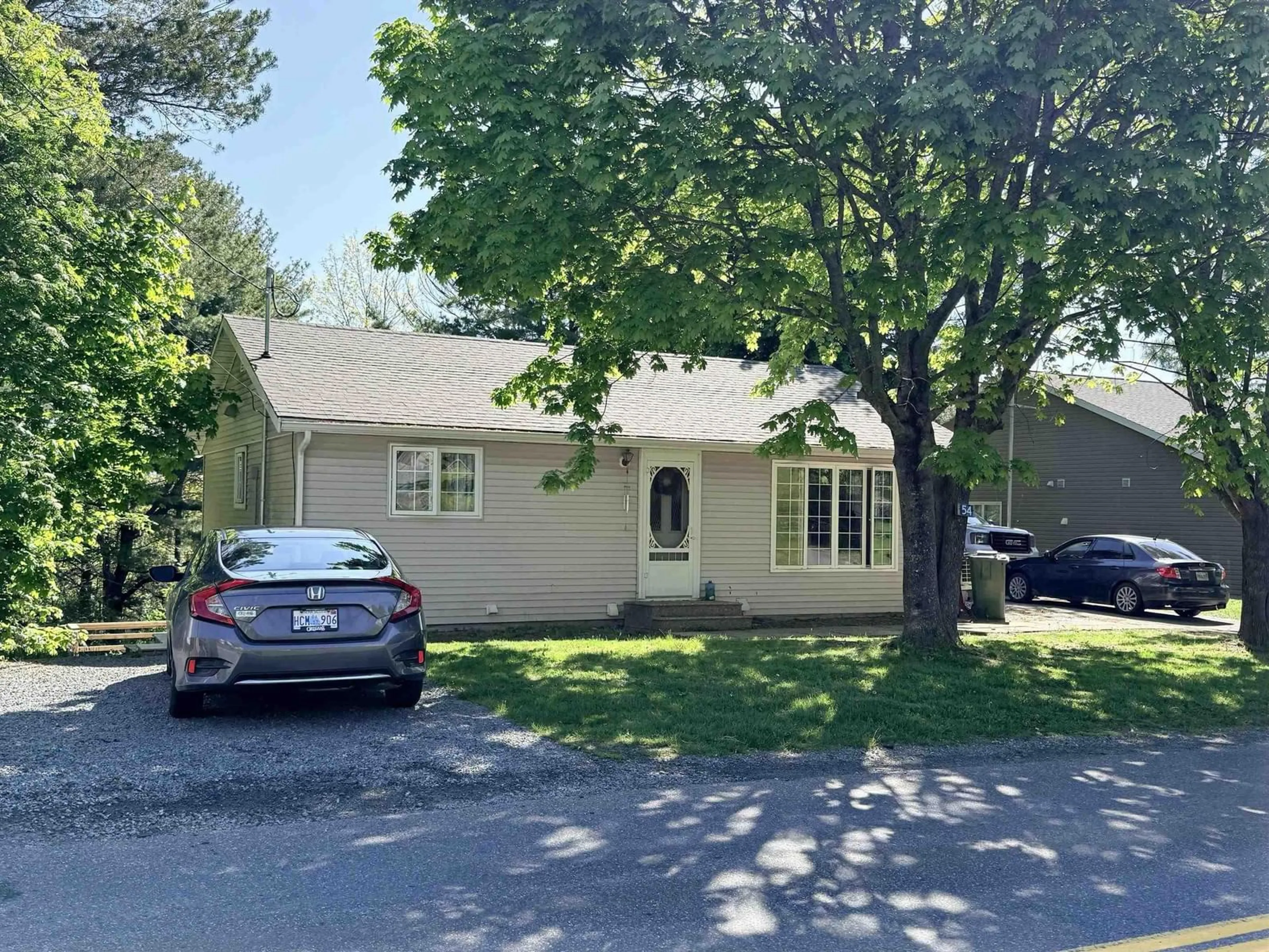 A pic from outside/outdoor area/front of a property/back of a property/a pic from drone, street for 54 Maple Ave, Lunenburg Nova Scotia B0J 2C0