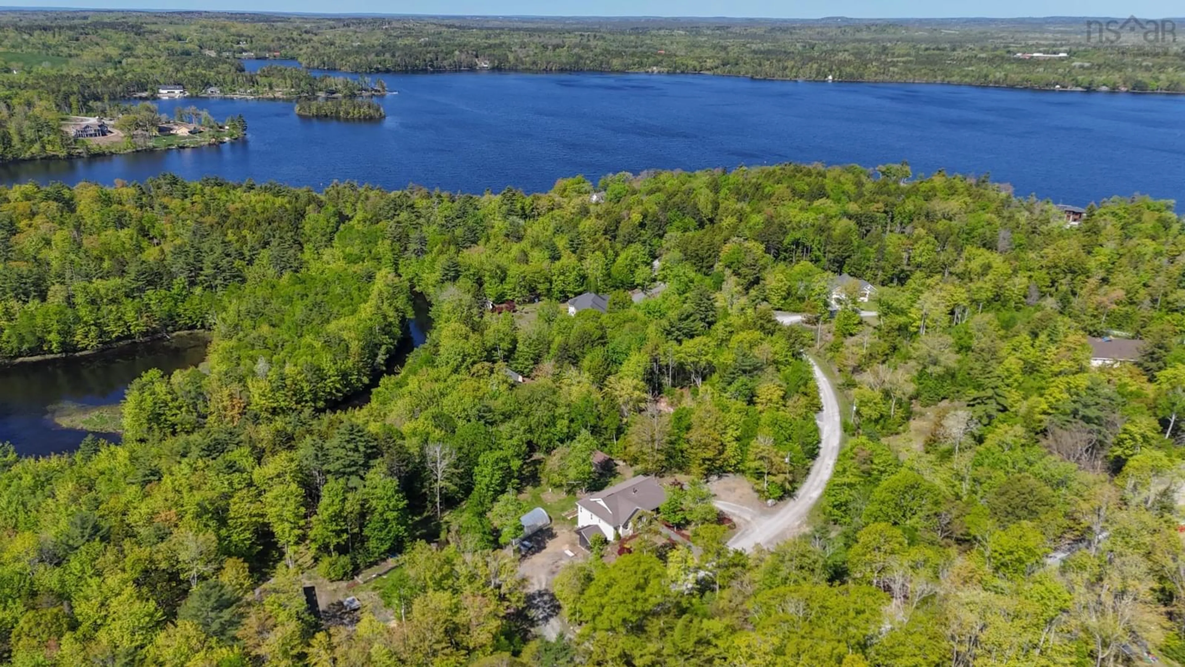 A pic from outside/outdoor area/front of a property/back of a property/a pic from drone, water/lake/river/ocean view for 82 Lazy River Rd, Conquerall Mills Nova Scotia B4V 6B4
