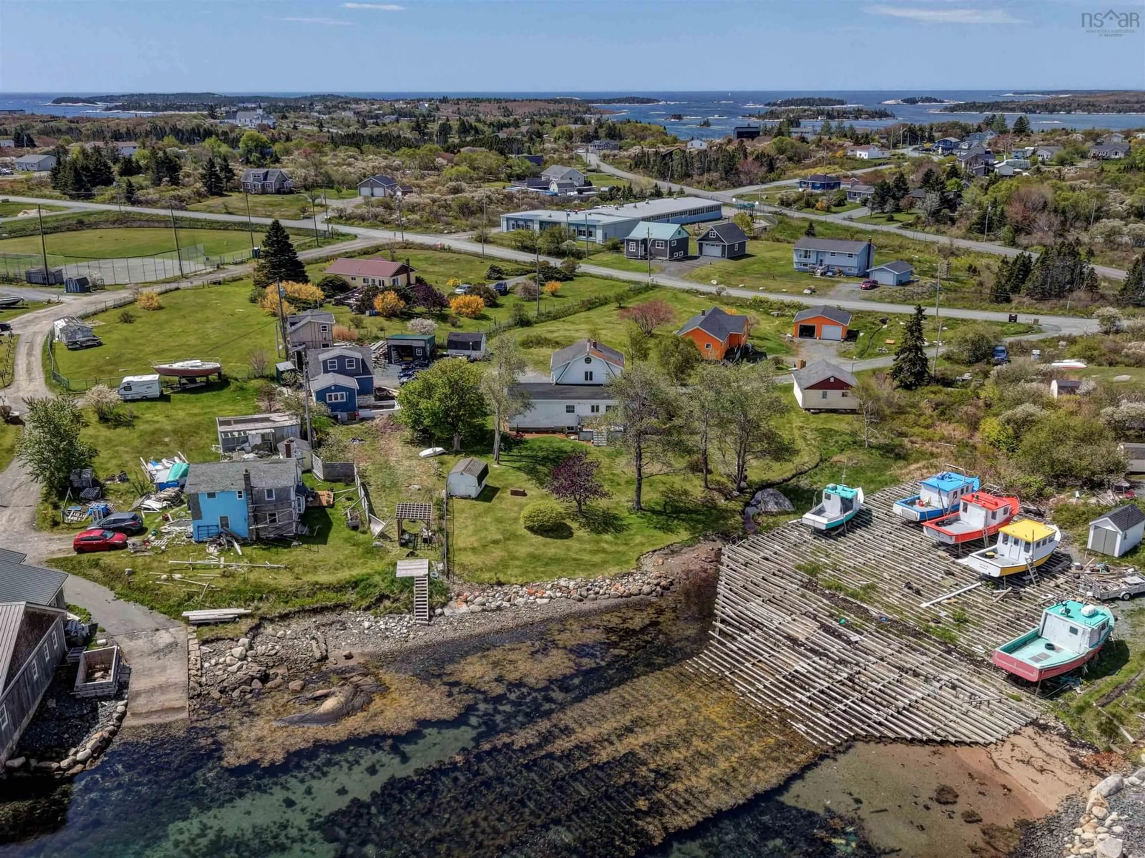 A pic from outside/outdoor area/front of a property/back of a property/a pic from drone, water/lake/river/ocean view for 8 Harrie Dr, Terence Bay Nova Scotia B3T 1Y2