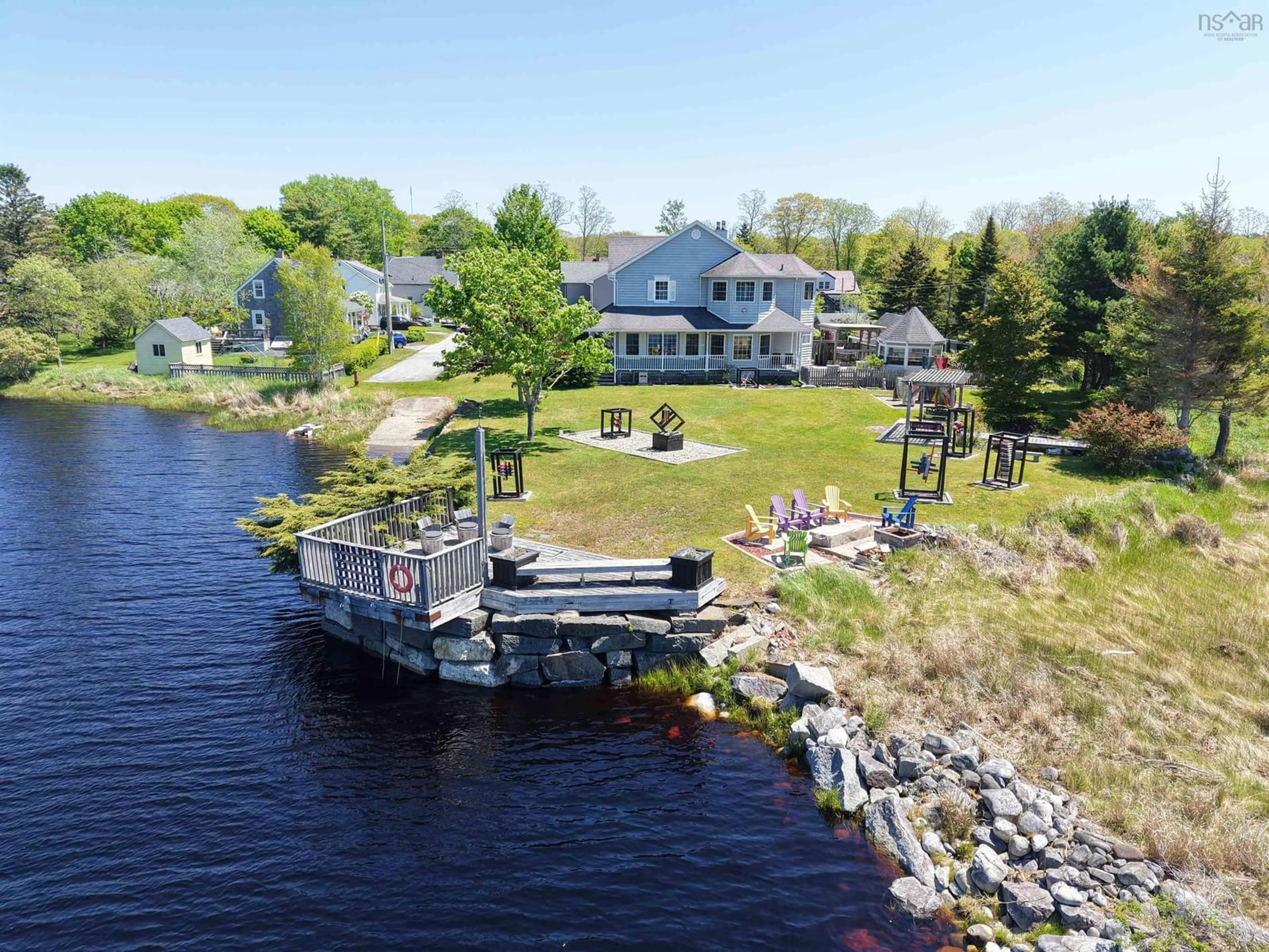 A pic from outside/outdoor area/front of a property/back of a property/a pic from drone, water/lake/river/ocean view for 3 Ryers Lane, Shelburne Nova Scotia B0T 1W0