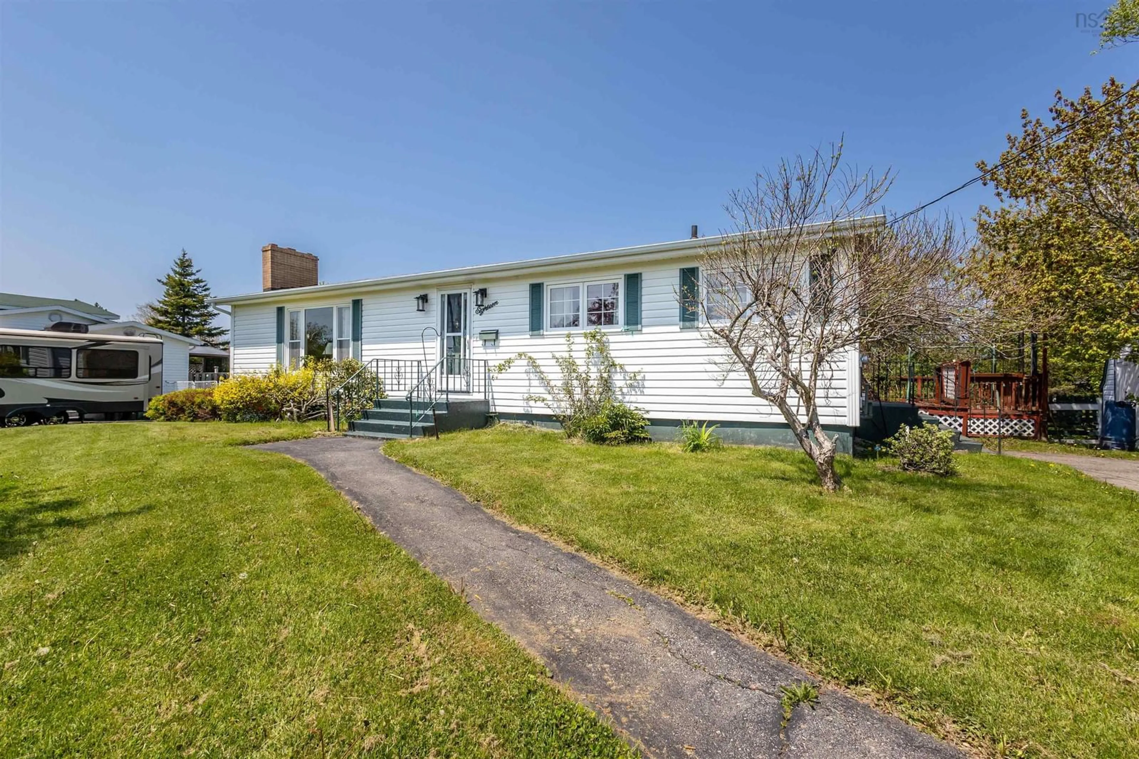 A pic from outside/outdoor area/front of a property/back of a property/a pic from drone, street for 18 Macnamara Ave, Coxheath Nova Scotia B1R 2C2