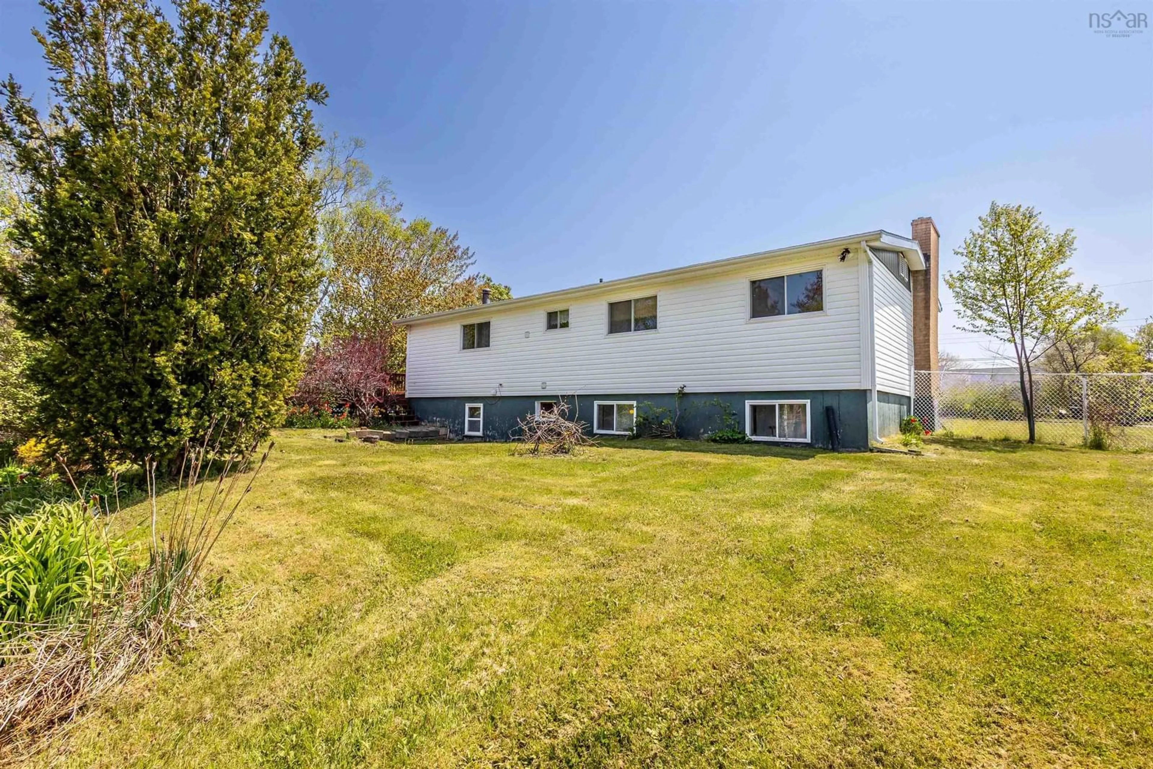 A pic from outside/outdoor area/front of a property/back of a property/a pic from drone, unknown for 18 Macnamara Ave, Coxheath Nova Scotia B1R 2C2
