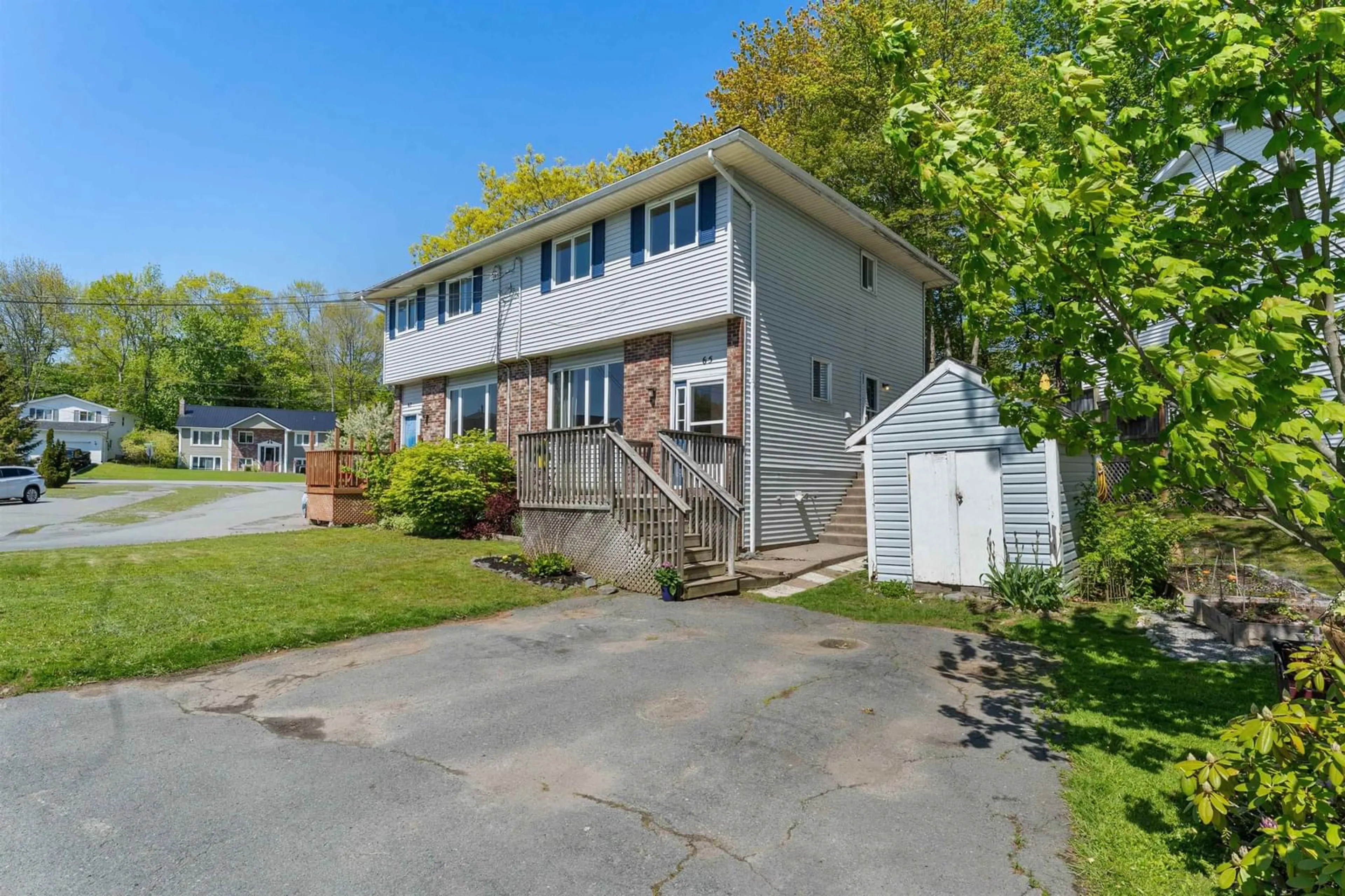 A pic from outside/outdoor area/front of a property/back of a property/a pic from drone, street for 65 Wynn Castle Dr, Lower Sackville Nova Scotia B4E 2H3