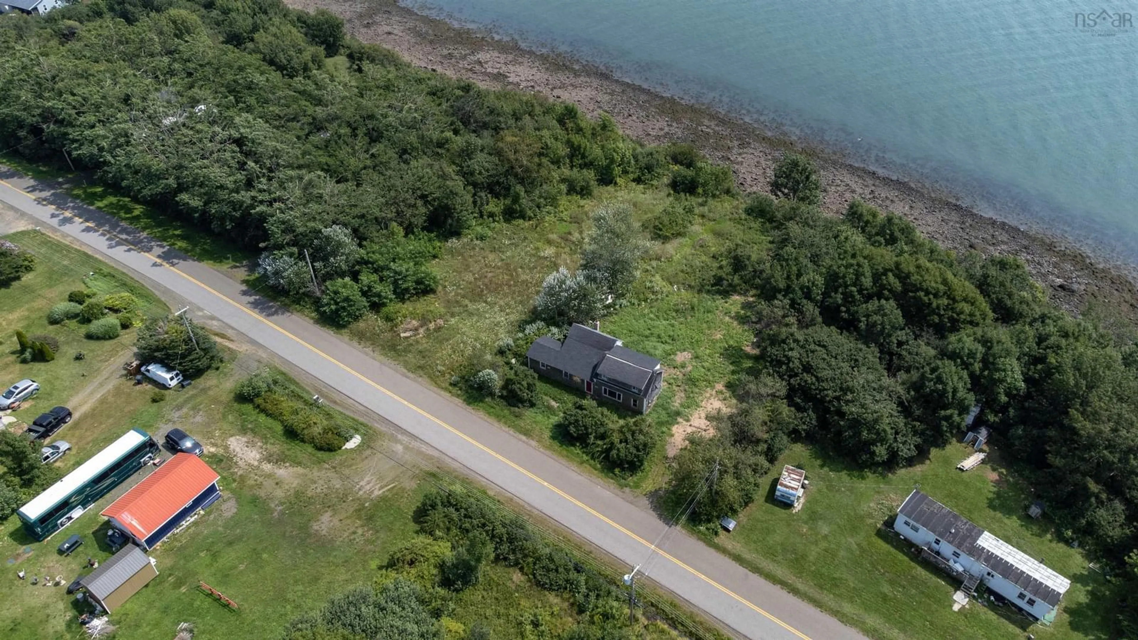 A pic from outside/outdoor area/front of a property/back of a property/a pic from drone, water/lake/river/ocean view for 1234 Granville Rd, Victoria Beach Nova Scotia B0S 1A0