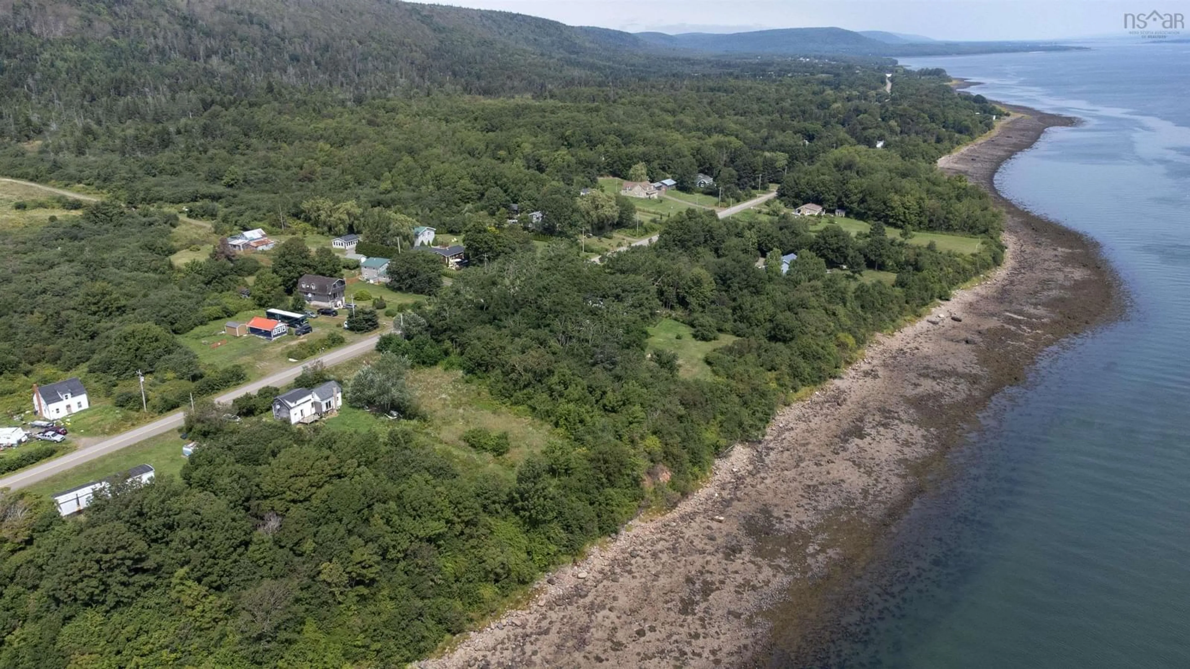 A pic from outside/outdoor area/front of a property/back of a property/a pic from drone, water/lake/river/ocean view for 1234 Granville Rd, Victoria Beach Nova Scotia B0S 1A0