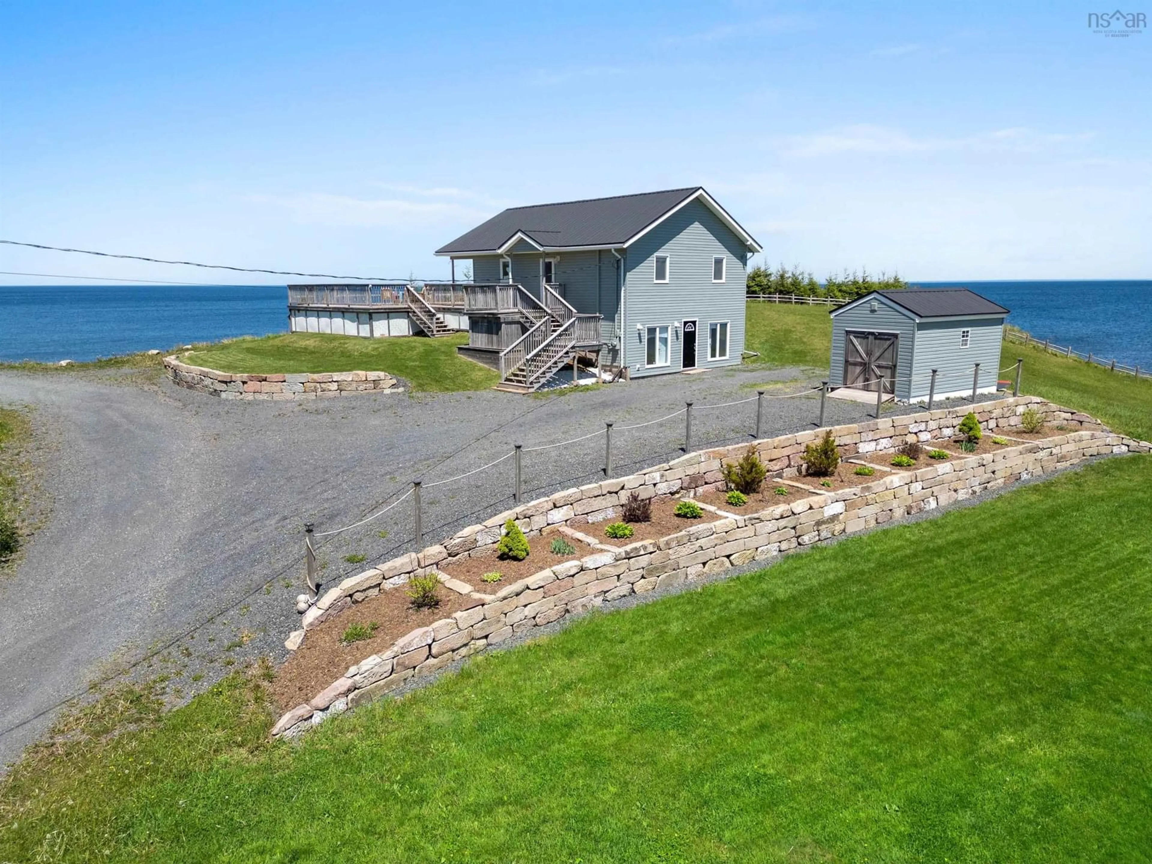 A pic from outside/outdoor area/front of a property/back of a property/a pic from drone, water/lake/river/ocean view for 51 Heron Loop, Caribou River Nova Scotia B0K 1H0