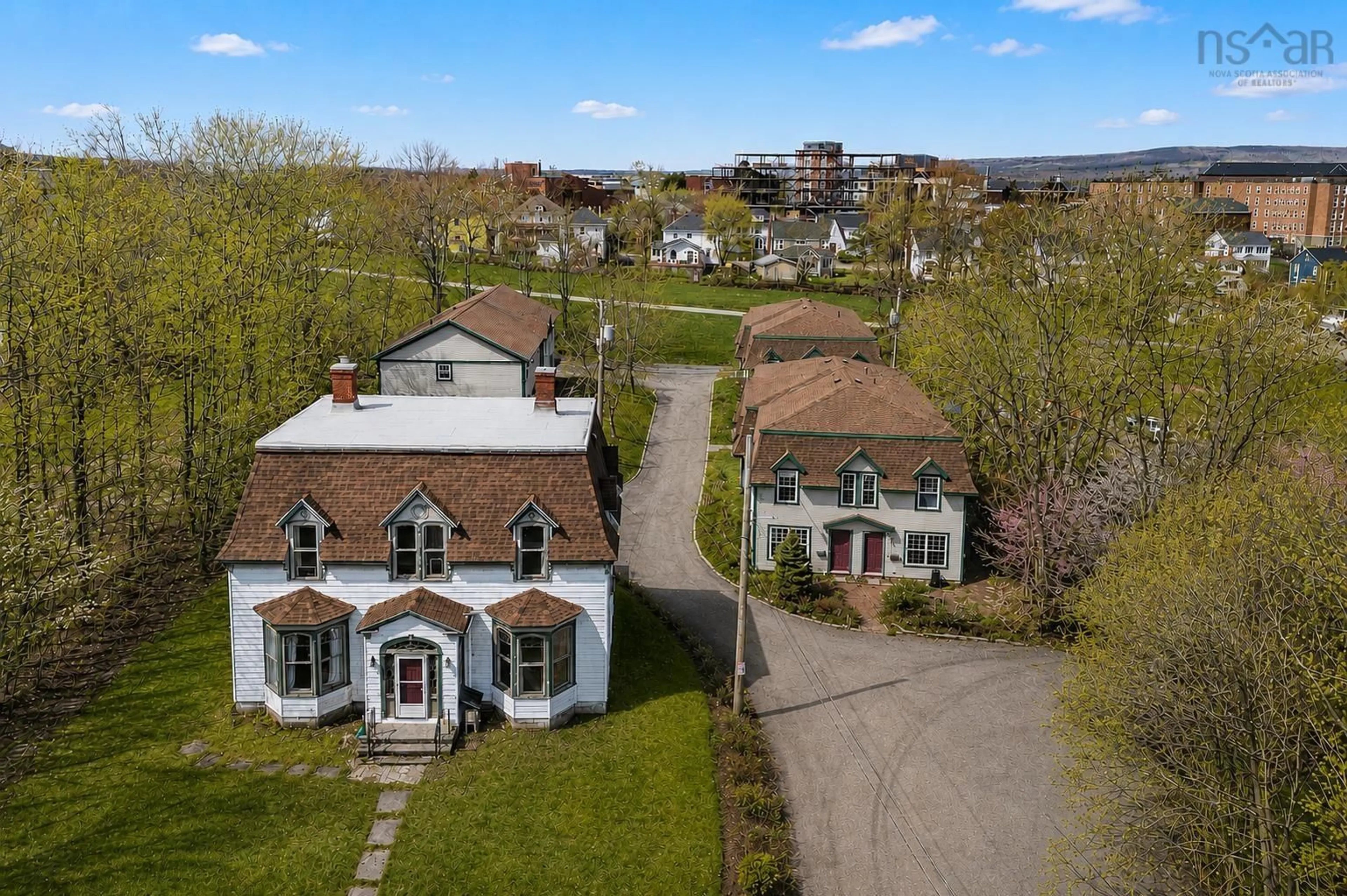 A pic from outside/outdoor area/front of a property/back of a property/a pic from drone, street for 84, 86, 88 Church St, Antigonish Nova Scotia B2G 2E1